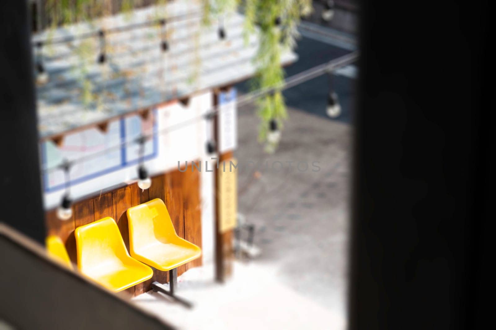 Yellow plastic seats on the road, stock photo
