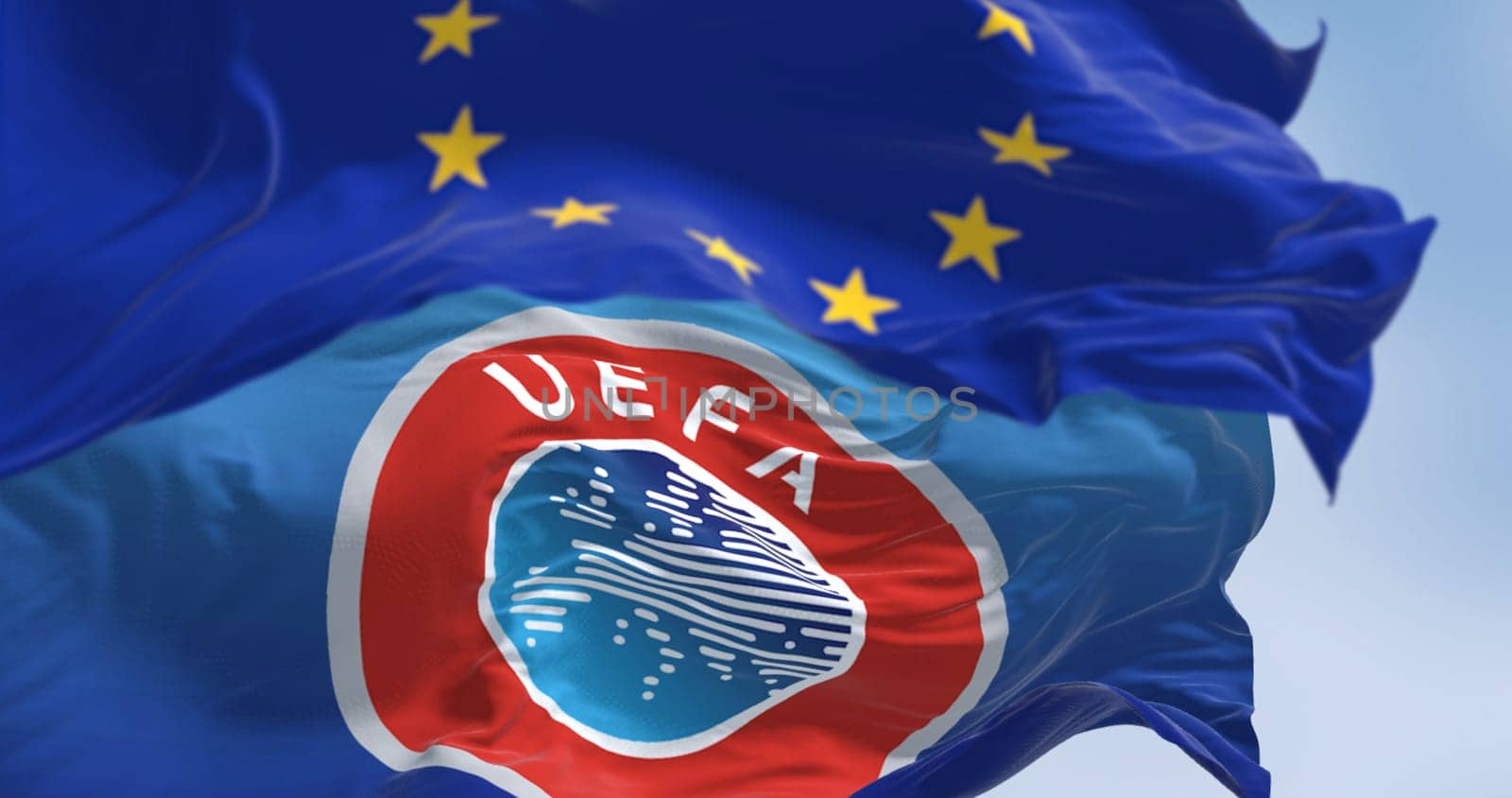 Luxemburg City, LU, Dec 21 2023: Close-up of European Union and UEFA flags waving in the wind. On Dec 2023 European Court of Justice Declares UEFA, FIFA Block of European Super League Unlawful