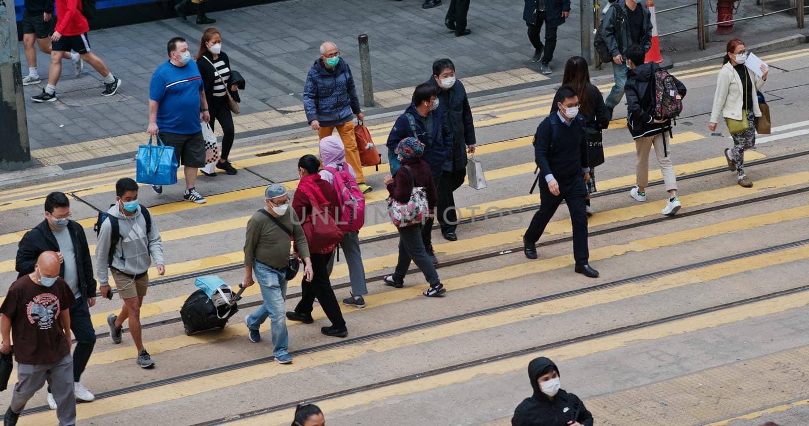 Central, Hong Kong 15 December 2020: Top view of the people cross the road