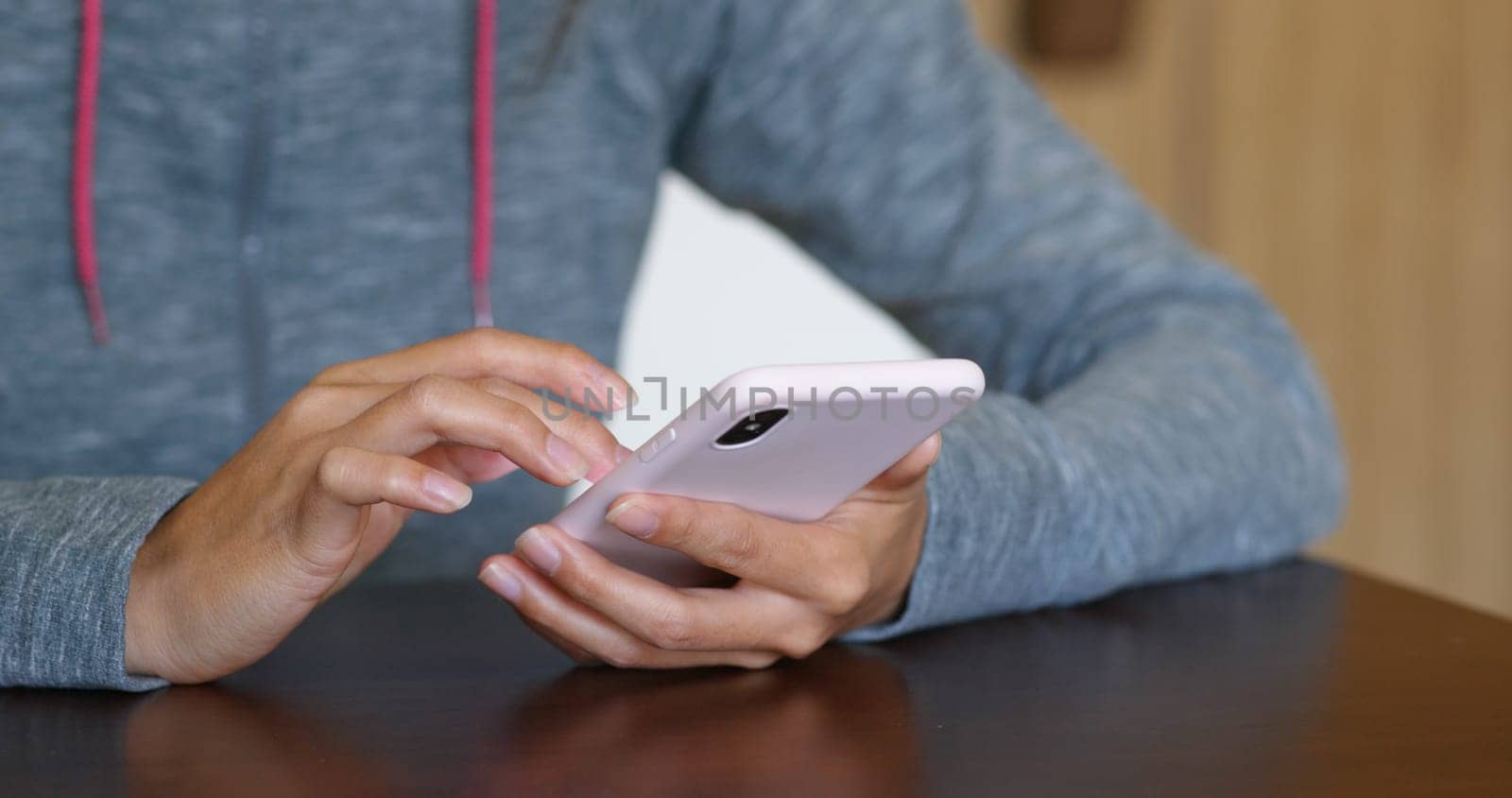 Woman use of smart phone at home