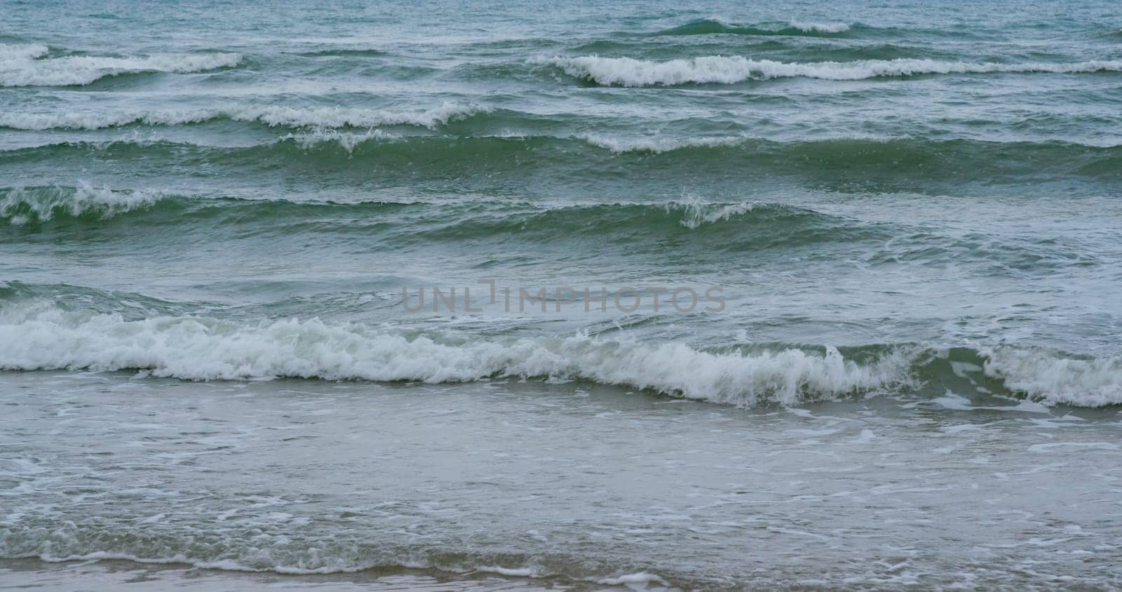Ocean water wave on the beach