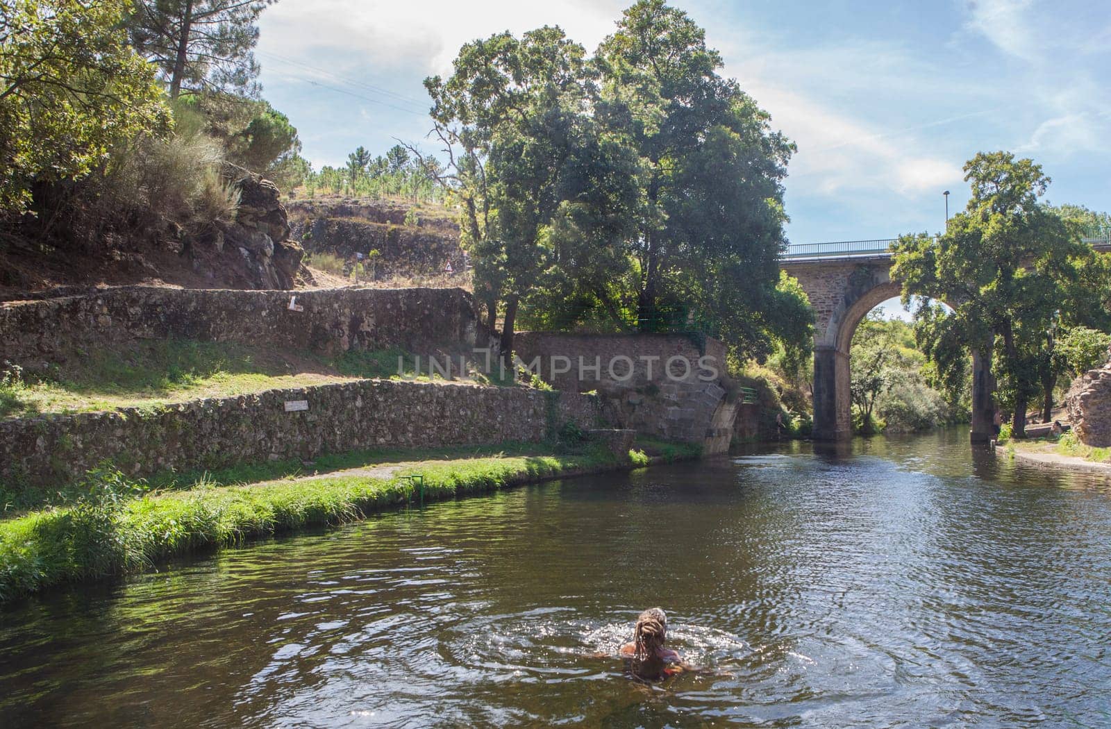 Perales del Puerto natural swimming pool. Crystal-clear waters spot in the heart of Sierra de Gata, Caceres, Extremadura, Spain