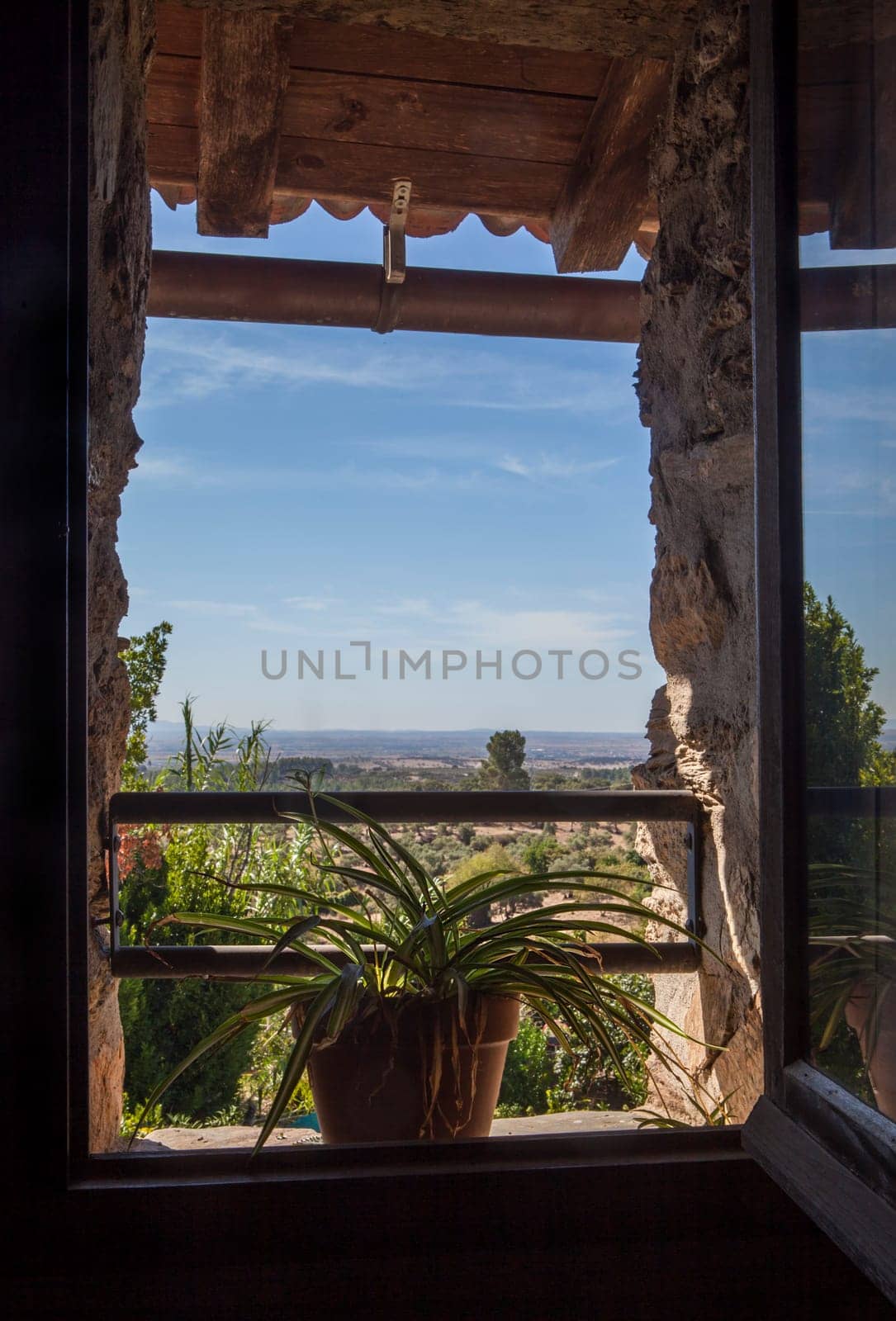 Landscape of Sierra de Gata seen from a window of a rural accommodation. Perales del Puerto, Caceres, Spain