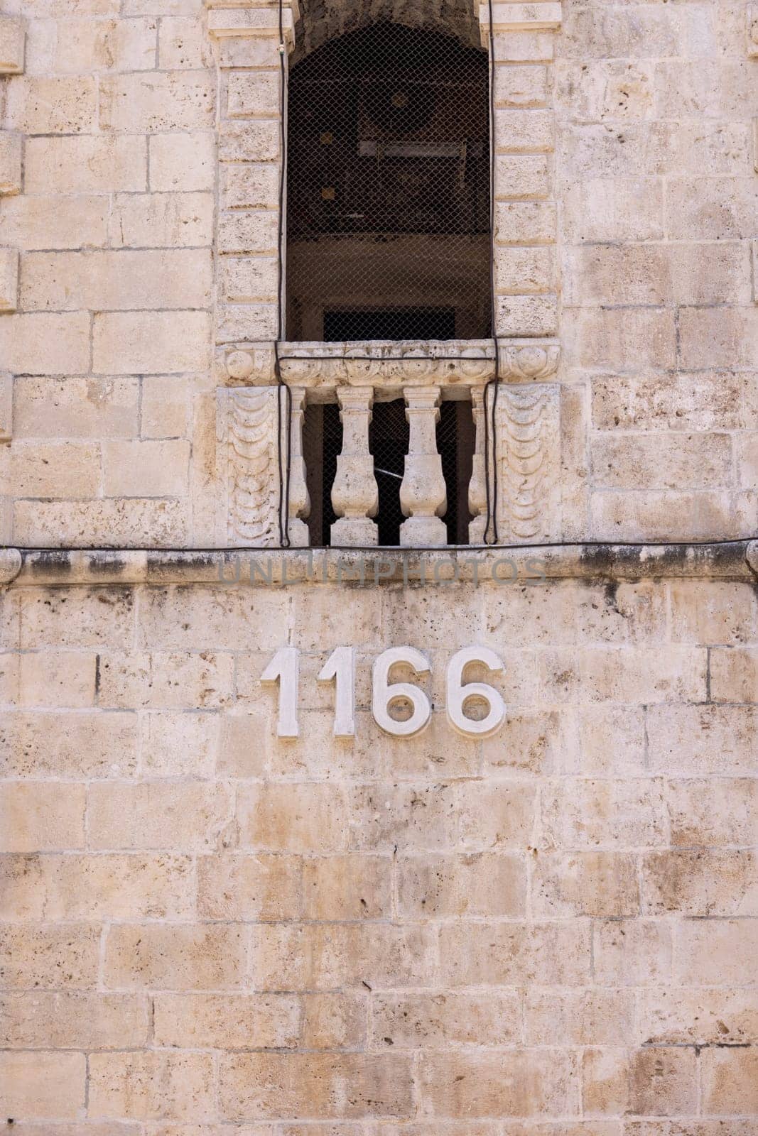 Kotor, Montenegro - June 26, 2023: Facade of Cathedral of Saint Tryphon (Kotor Cathedral), roman catholic medieval church. Cathedral was consecrated in 1166.