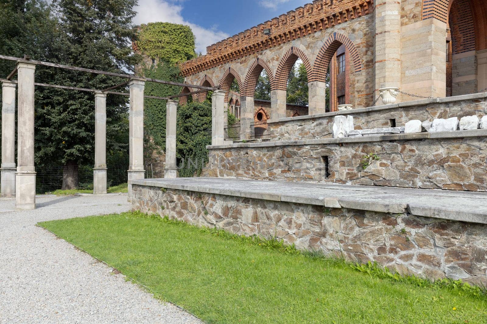 Kamieniec Zabkowicki, Poland - October 2, 2021: Kamieniec Zabkowicki Palace, 19th-century palace located in a village in the Lower Silesian Voivodeship. Fragment of the wall surrounding the building