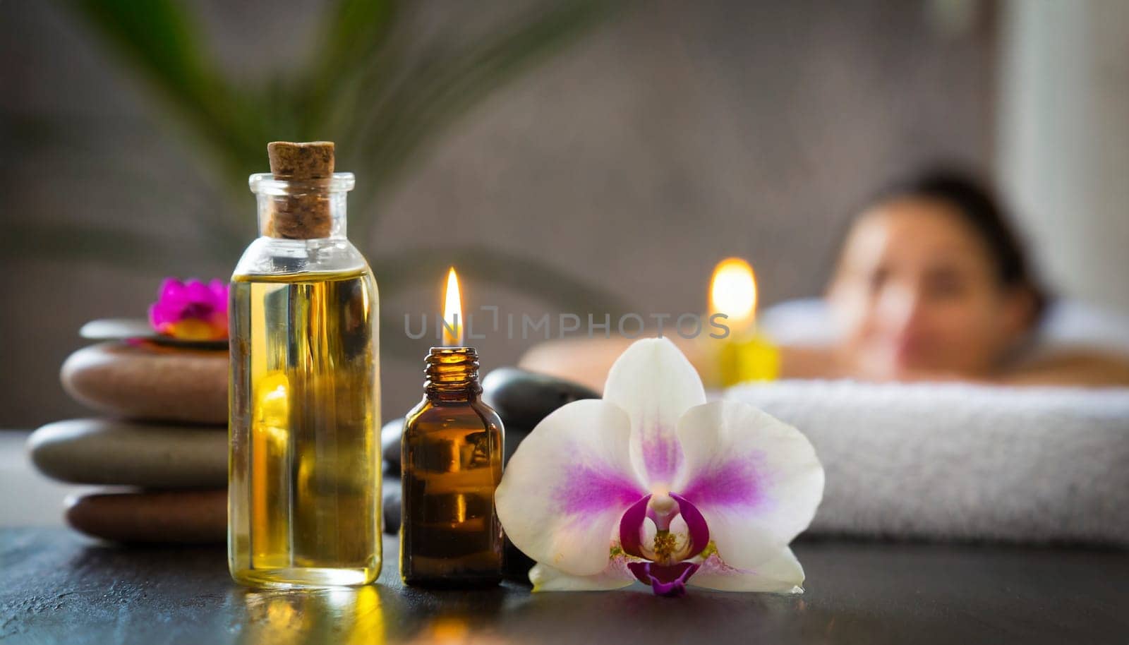 Spa still life with orchids, candles and towels on light background. AI generated