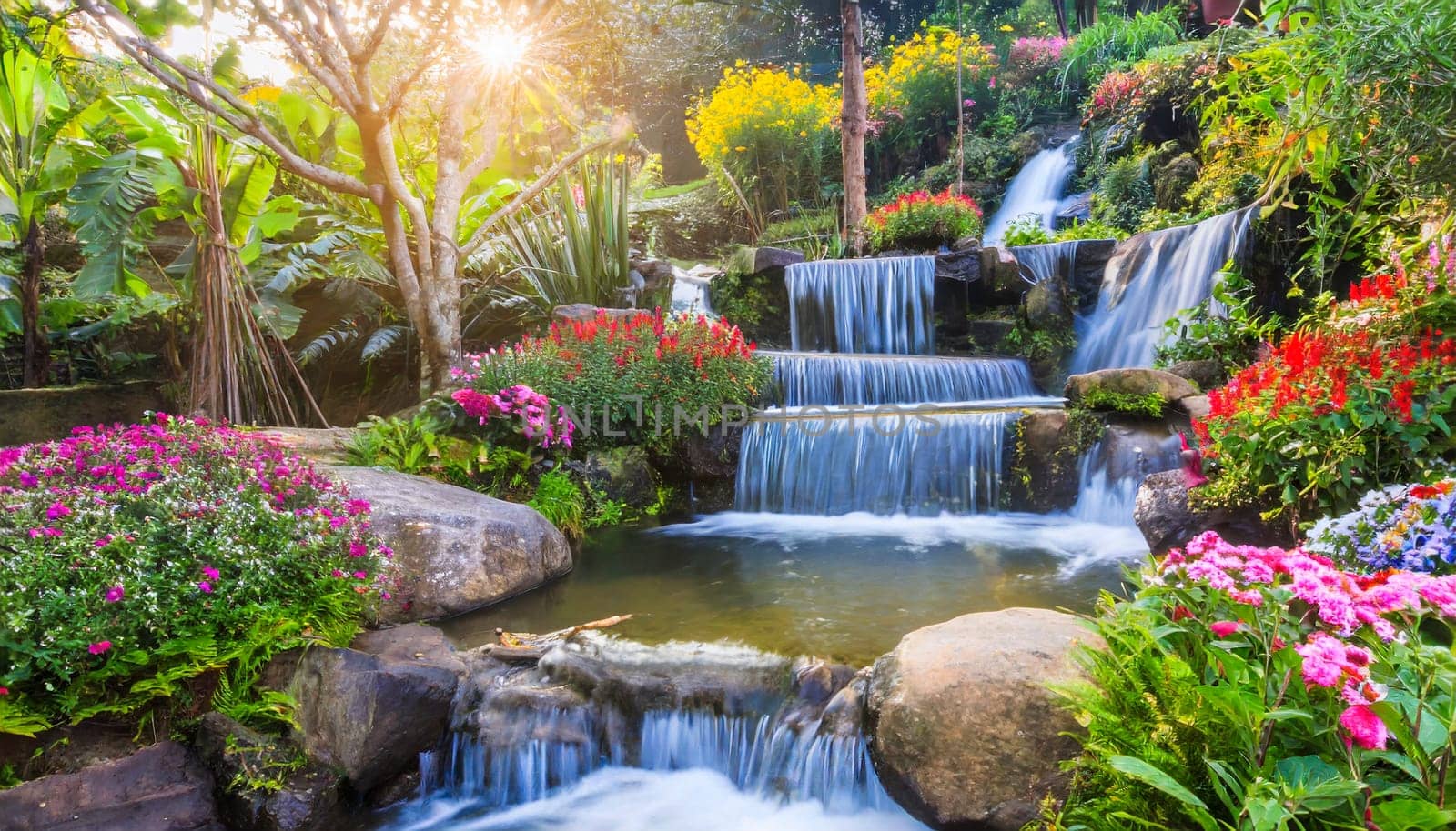 Waterfall in the garden with sunlight, beautiful nature landscape background. AI generated