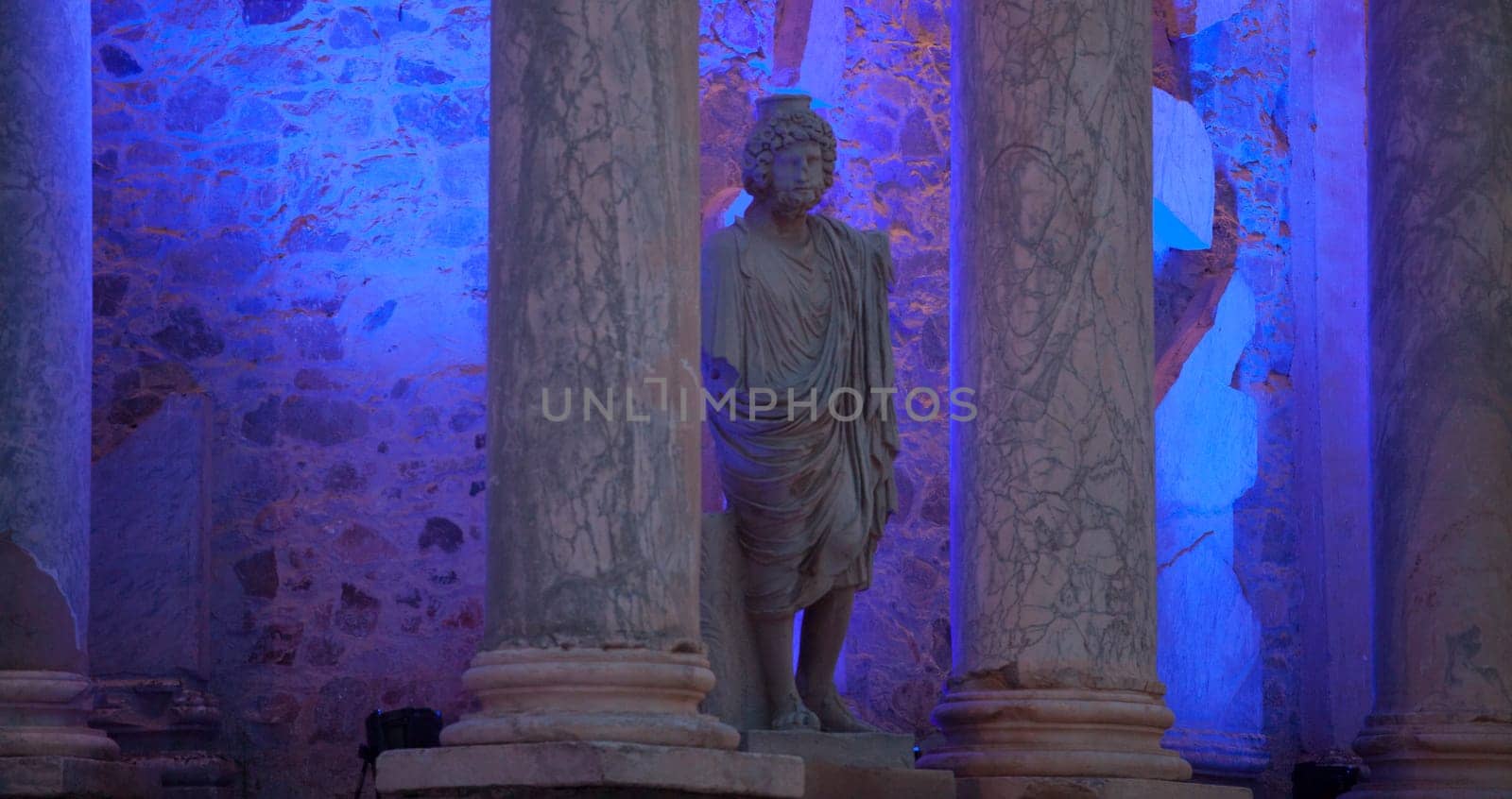 Merida, Spain - Jun 3rd, 2023: Roman Theatre stage illuminated during a performance. Emerita Ludica Festival 2023.