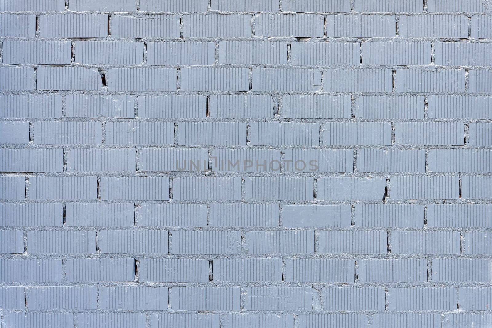 Background from a wall made of gray painted bricks