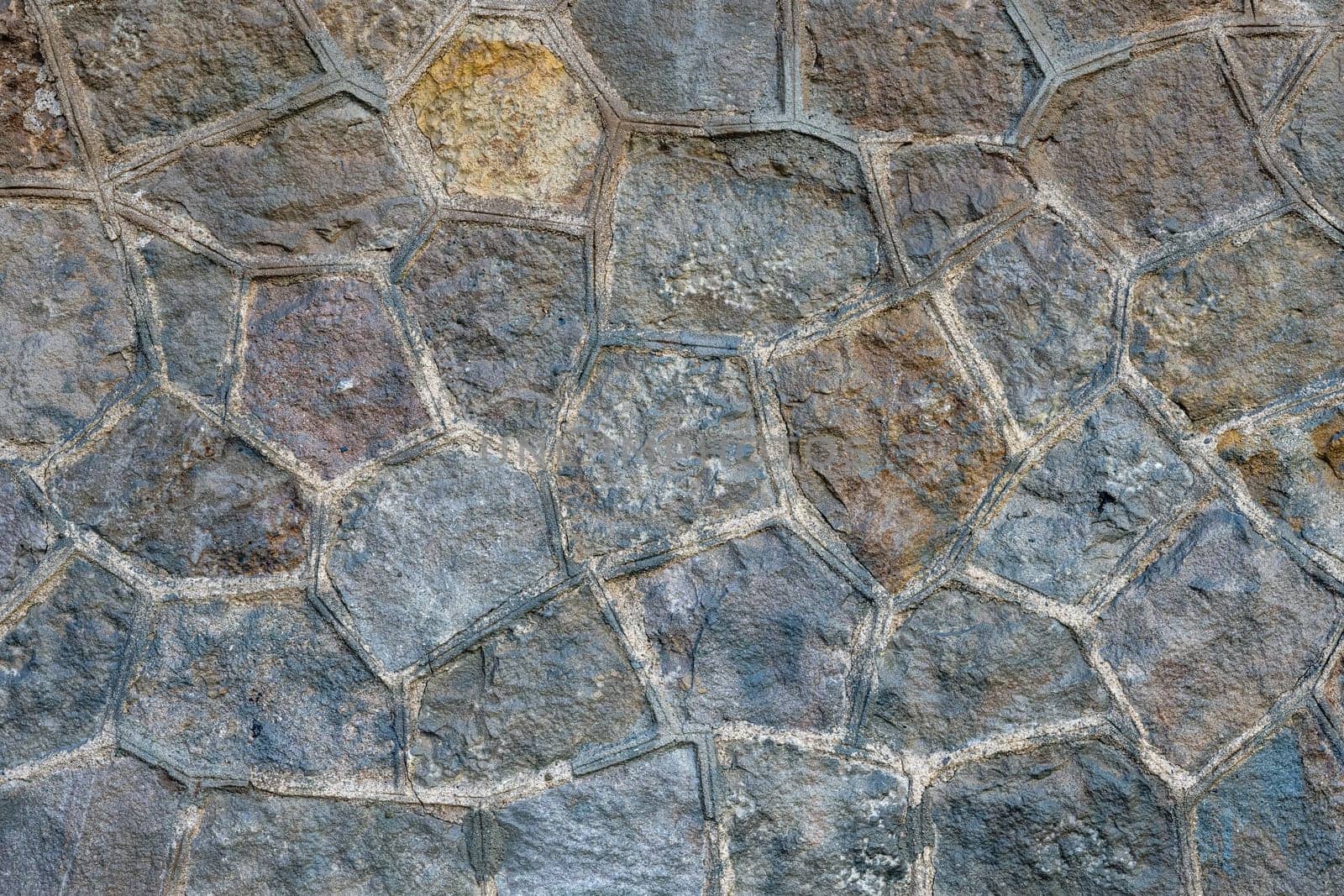 Background from an old wall made of natural stone