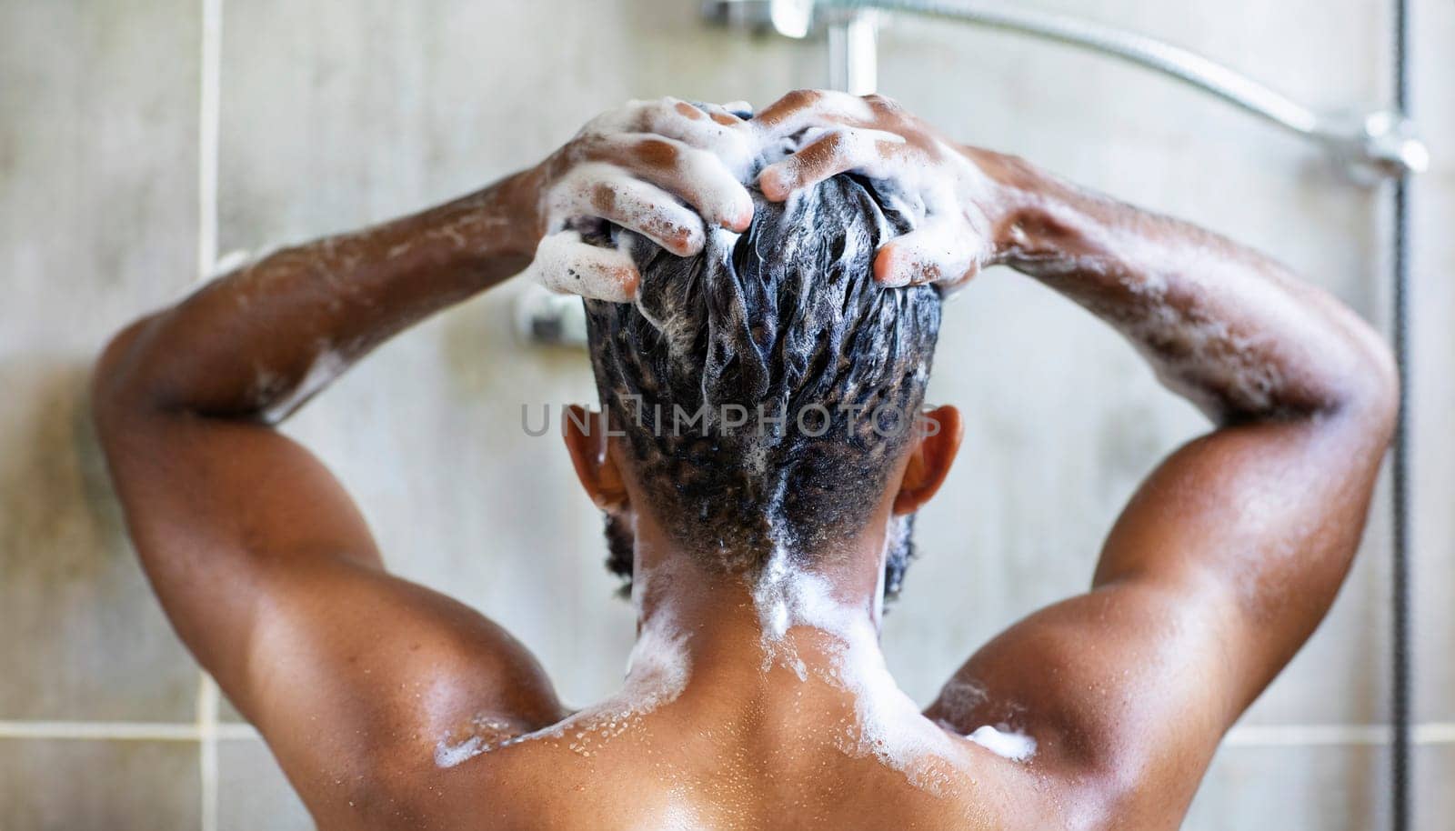 Man washing his hair in the shower, close-up, rear view. AI generated