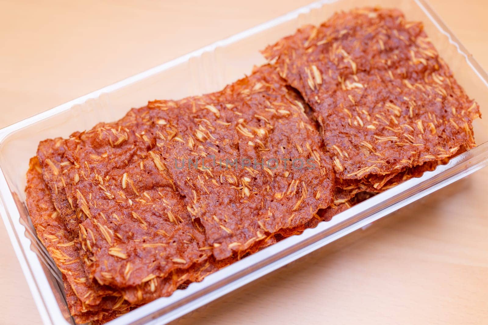 Sliced sheets of dried and crispy pork