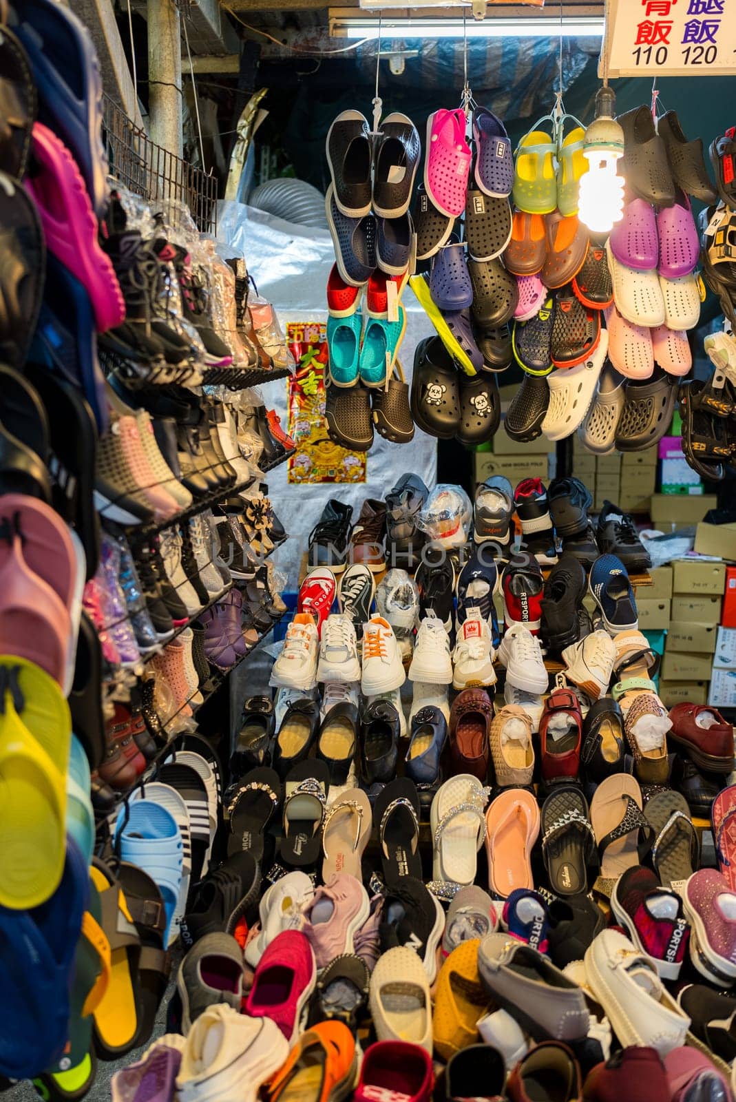 Taipei, Taiwan 18 October 2023: Shoe selling in Nanjichang street market in Taipei
