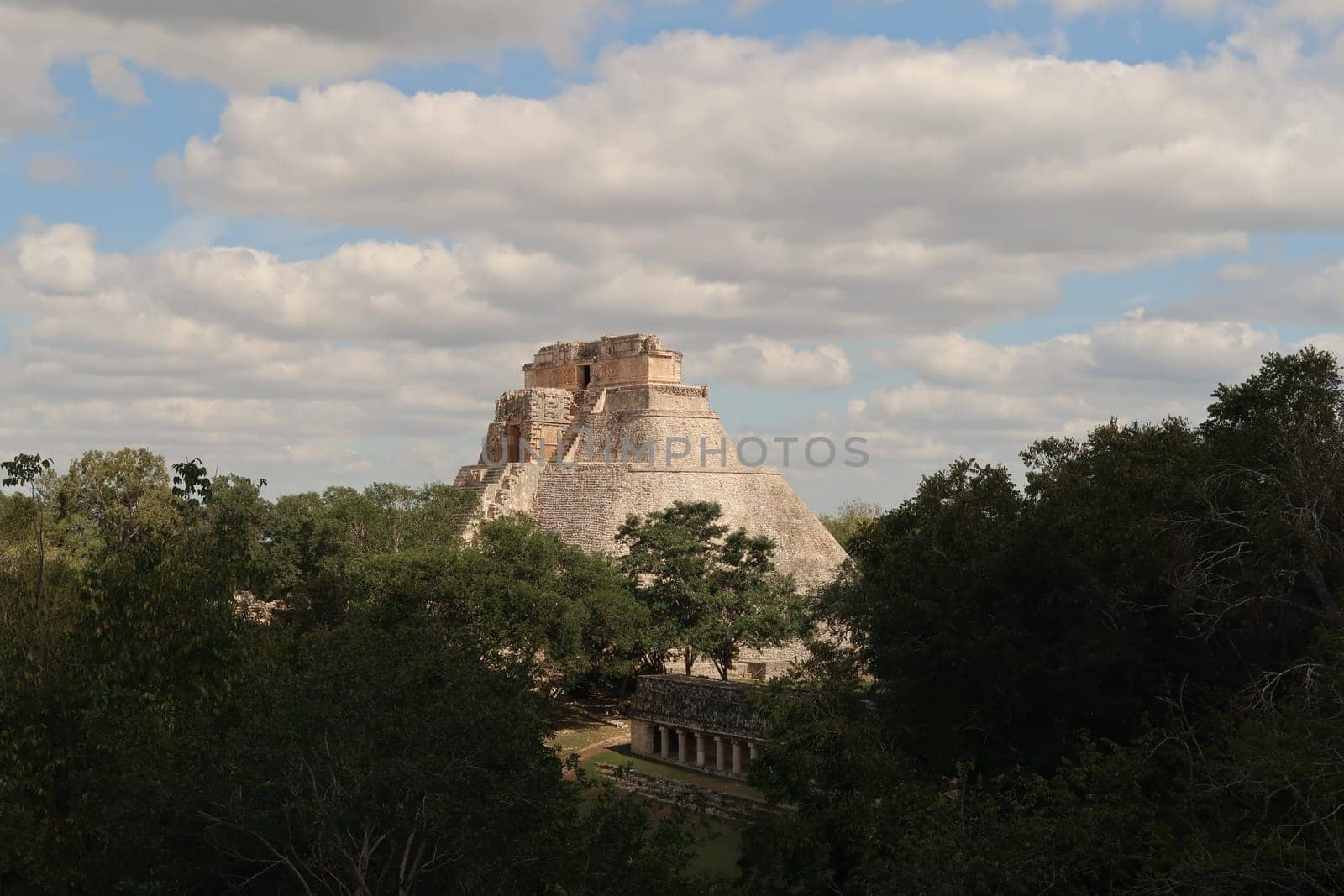 The majestic Pyramide of the Magician, Piramide del Advino from a distance, Uxmal, close to Merida, Mexico 2022