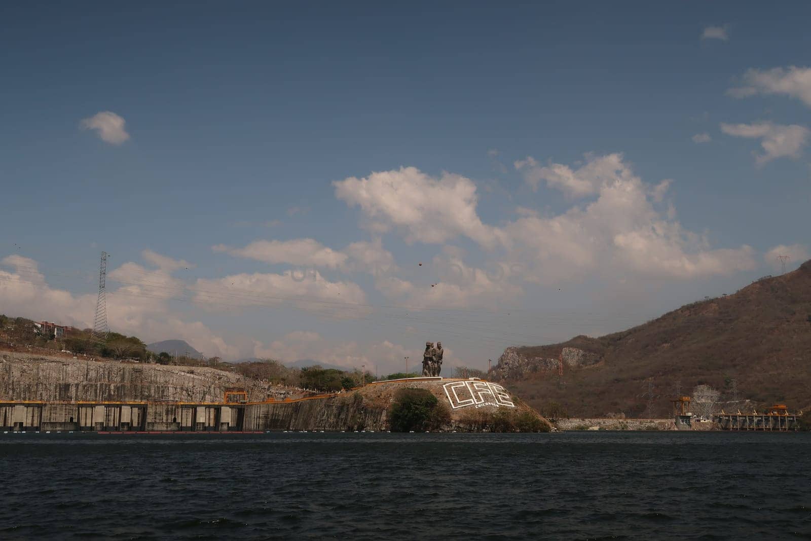 The Chicoasen Dam/Presa and the workers monument at the end of the Sumiedero Canyon/Canon del Sumidero, Chiapas, Mexico 2022