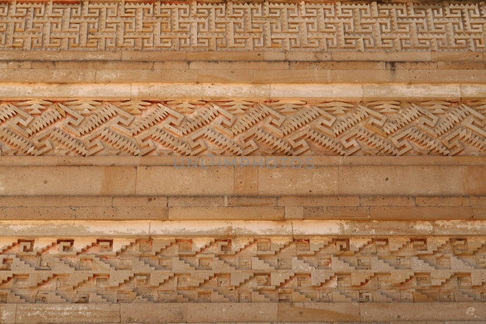 Patterns and shapes on one of the outer walls of The Palace/Grand Hall of Columns, at the archaeological site of MItla, Oaxaca, Mexico 2022