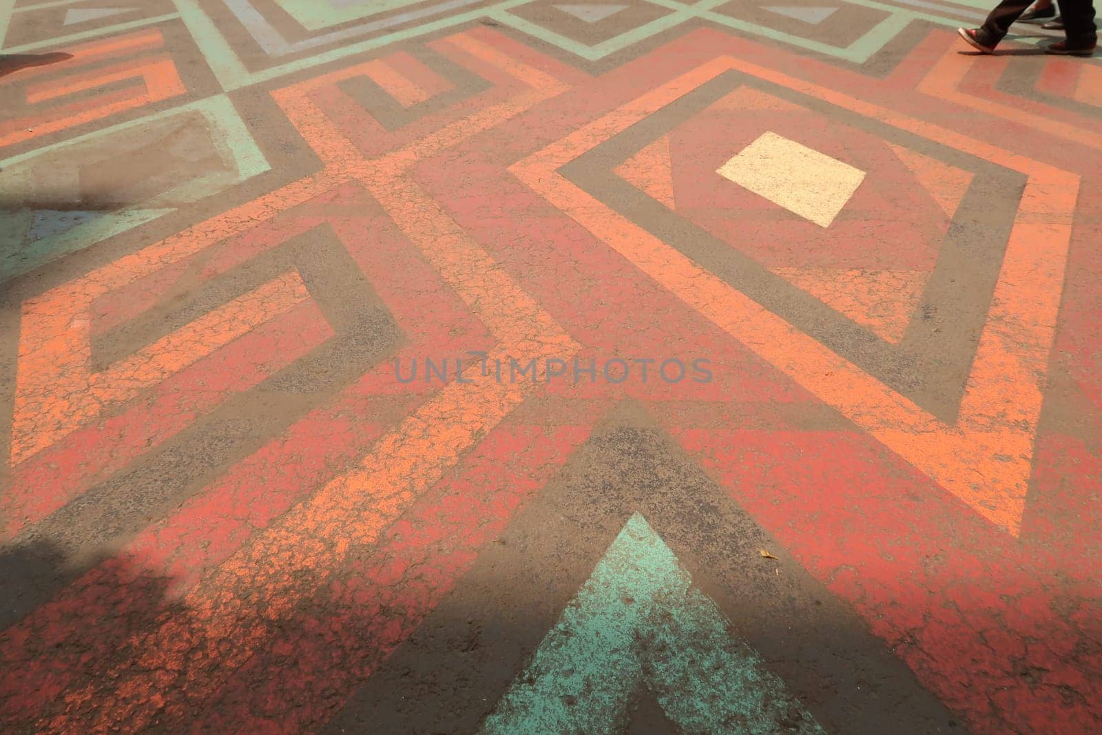 Colorful floors street painting street art in the pedestrian area next to the Zocalo Plaza de la Constitucion, Ciudad de Mexico, Mexico City 2022