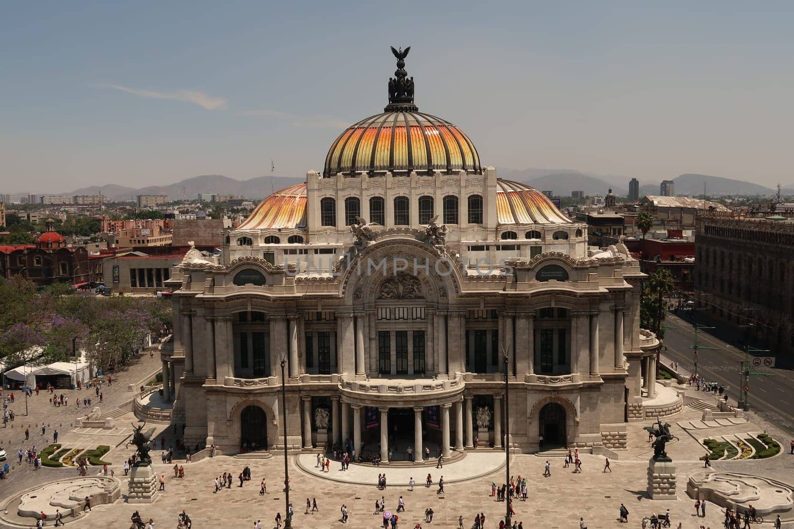 The Palacio de Bellas Artes/Palace of the Fine Arts on a sunny and busy day, Mexico City 2022