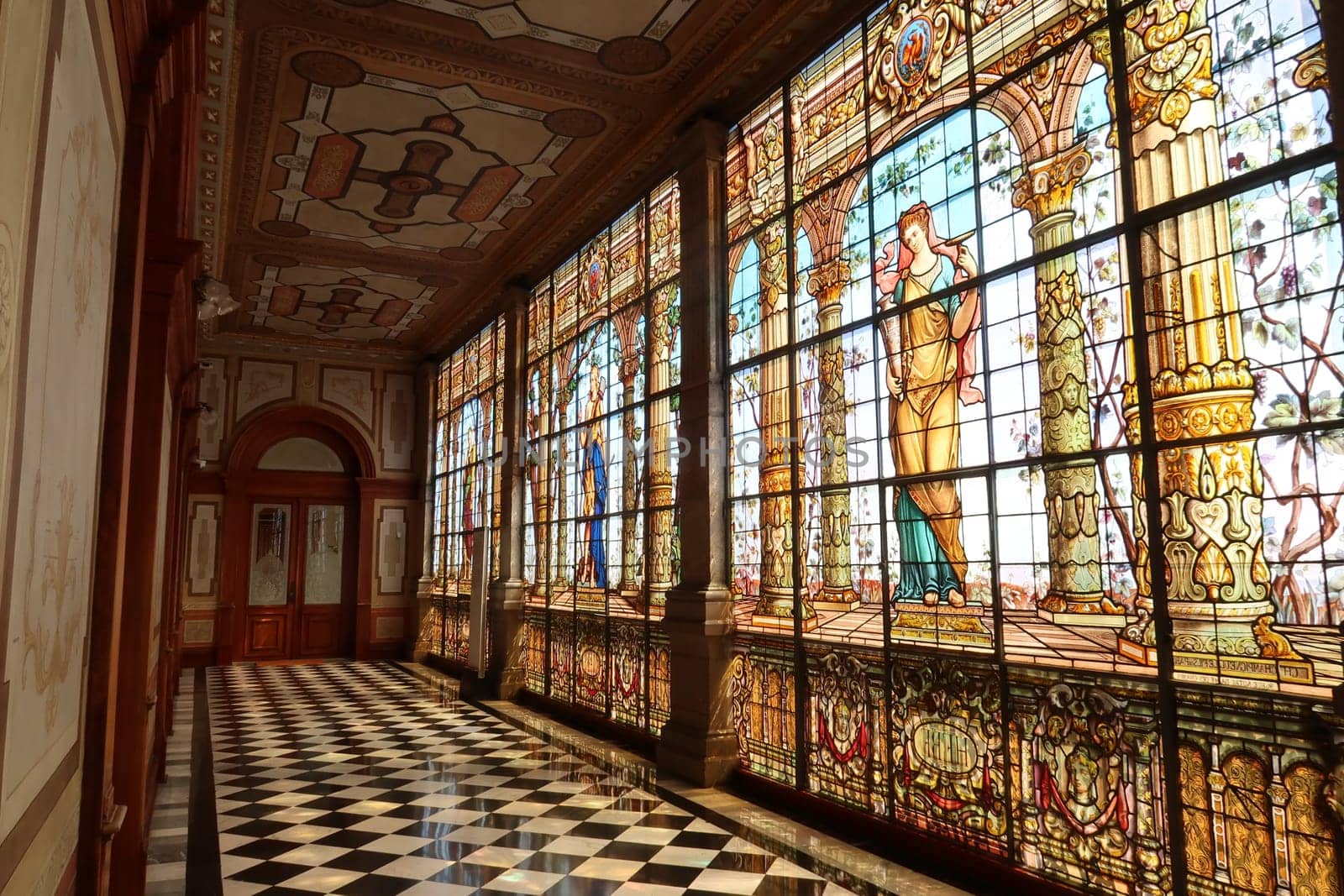 An entire hallway with stained glass windows at the Chapultepec Castle/Castillo de Chapultepec, Mexico City 2022
