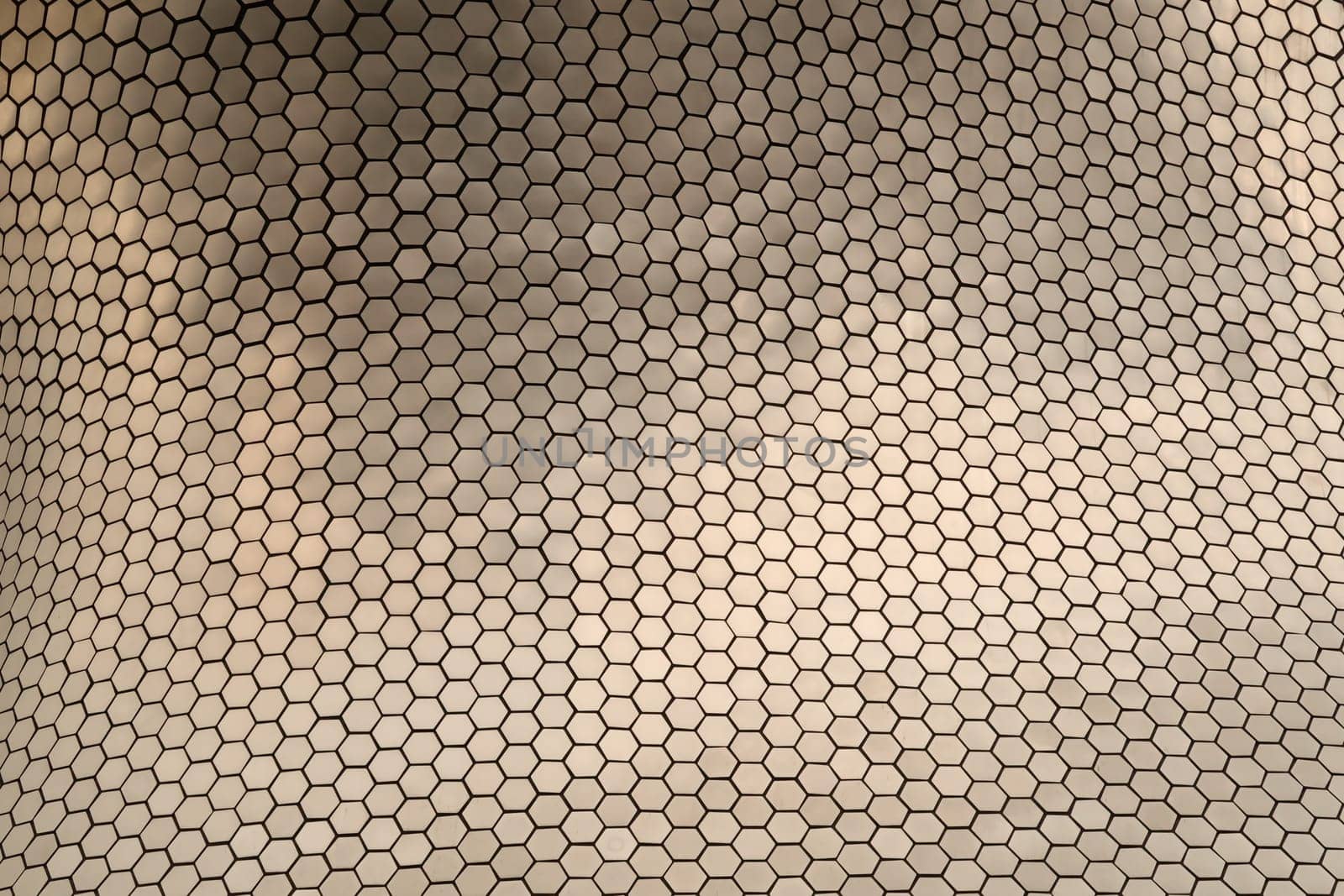 The pattern consisting of metal hexagons forming the facade of the Soumaya museum. Mexico City 2022