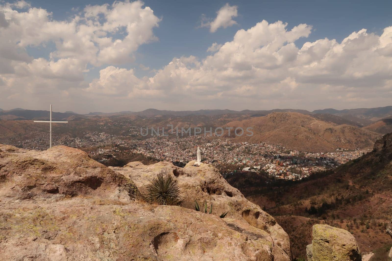 The Cerro de la Bufa with its Cross, the sculpture/statue of St. Virgin Mary/Madonna and Guanajuato in the background, Mexico 2022