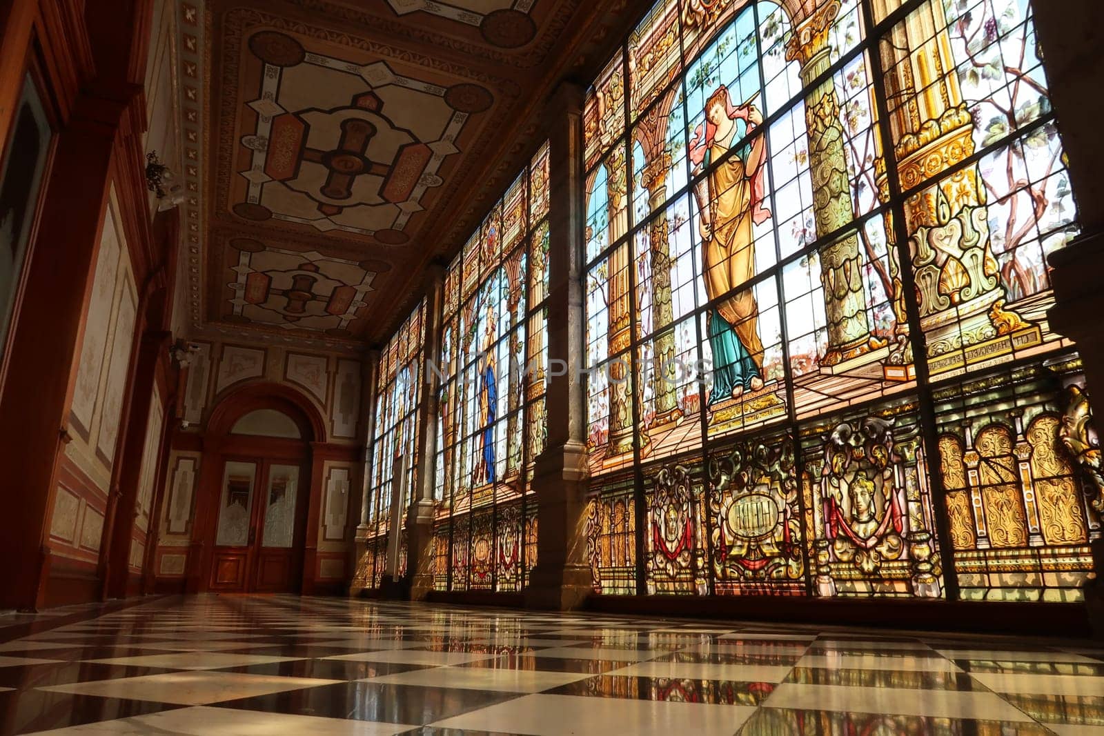An entire hallway full of stained glass windows at the Chapultepec Castle/Castillo de Chapultepec, Mexico City 2022