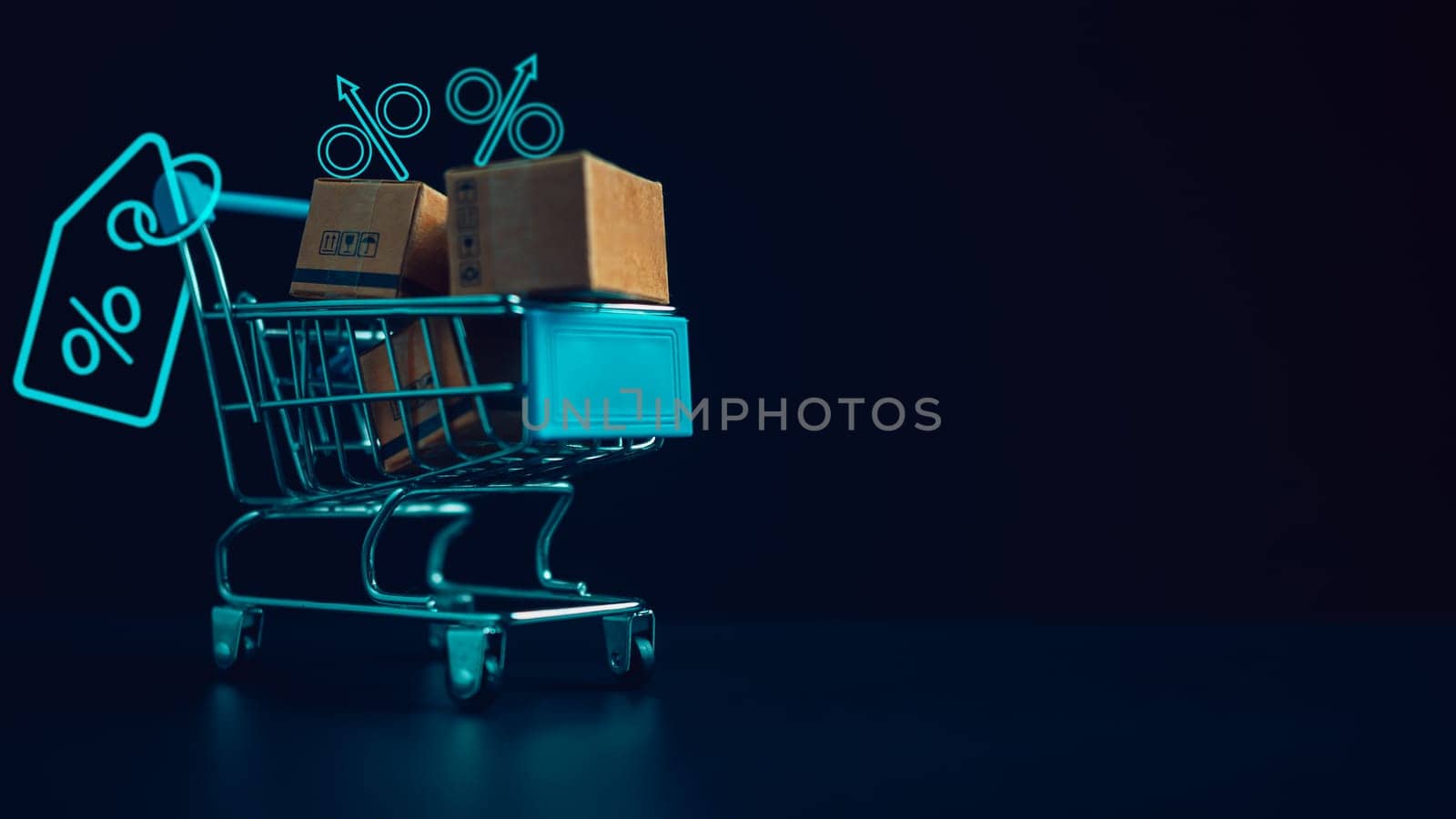Shopping concept. Paper boxes in blue shopping cart with sale price tag on white background. online shopping consumers can shop from home and delivery service. with copy space.