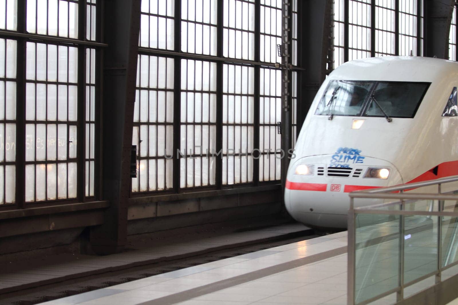 Berlin, Germany 1. April 2018: an ICE of the Deutsche Bahn enters the station Friedrichstreet