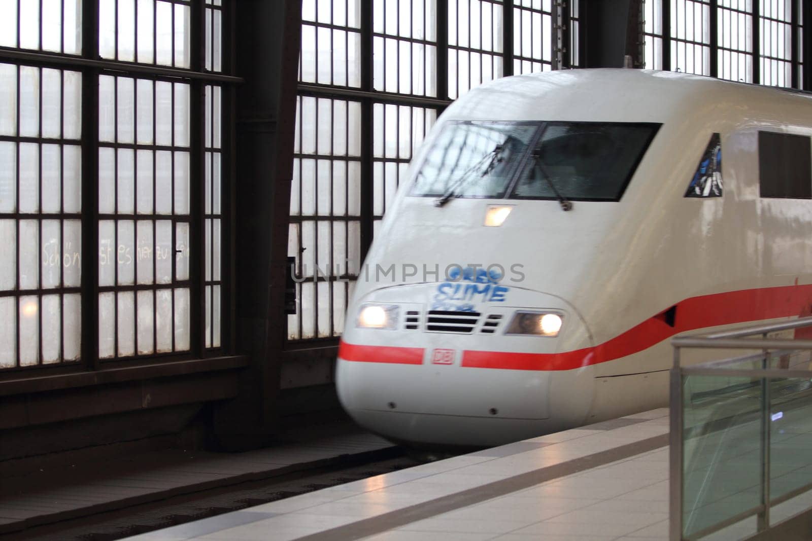 Berlin, Germany 1. April 2018: an ICE of the Deutsche Bahn enters the station Friedrichstreet