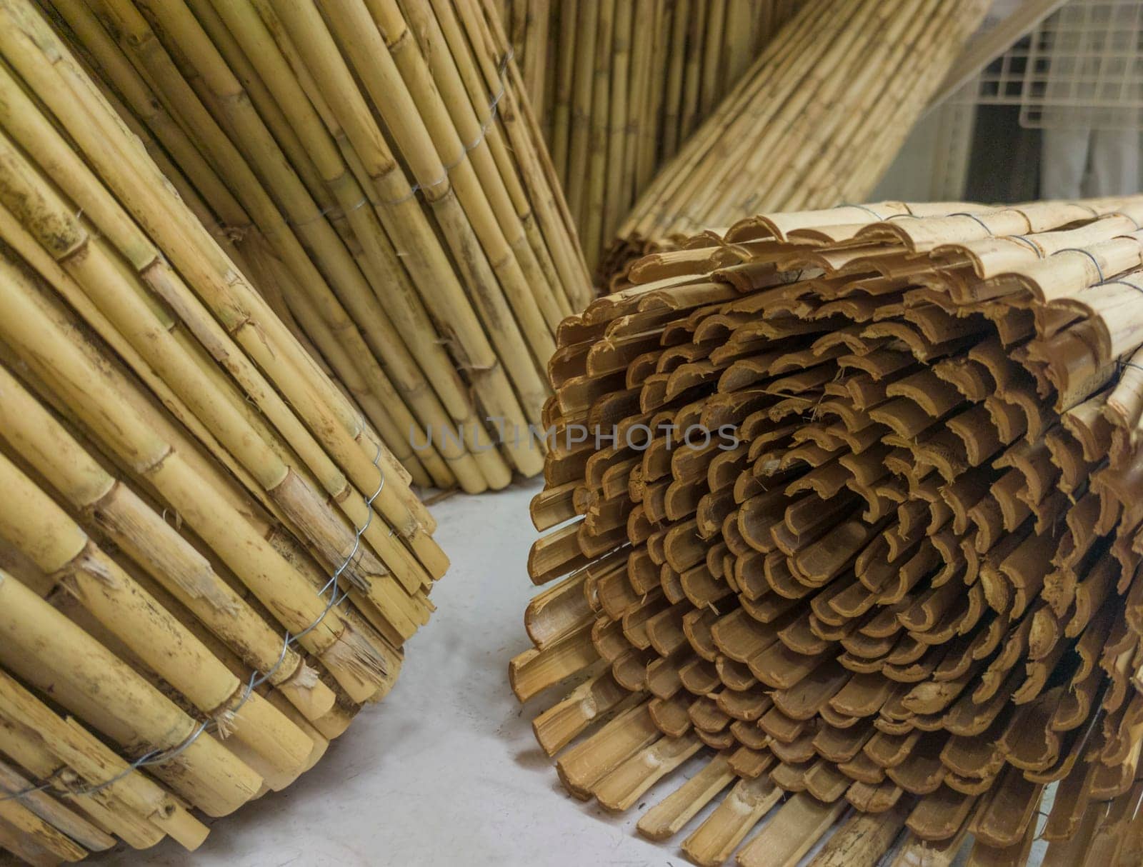 Garden fence rolls built with wattle. Selective focus