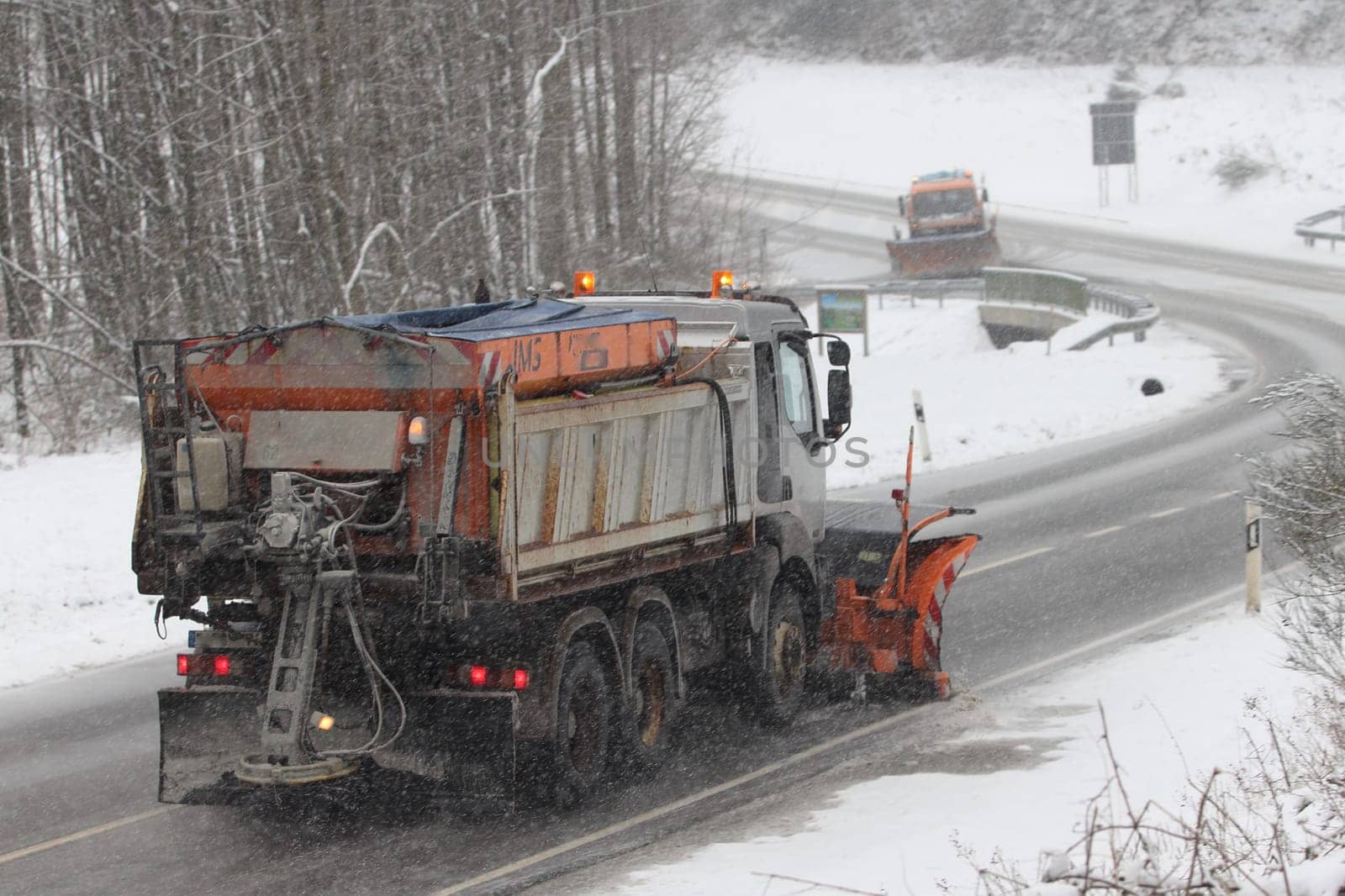 Birkenfeld, Germany February 6, 2018: A Winter service vehicle in use in heavy snow-fall