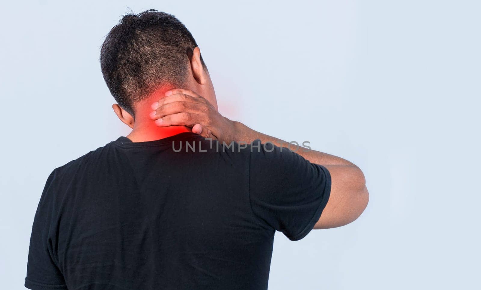 Neck pain and stress concept, Close up of man with neck pain, man with neck muscle pain, a man with neck pain on isolated background.