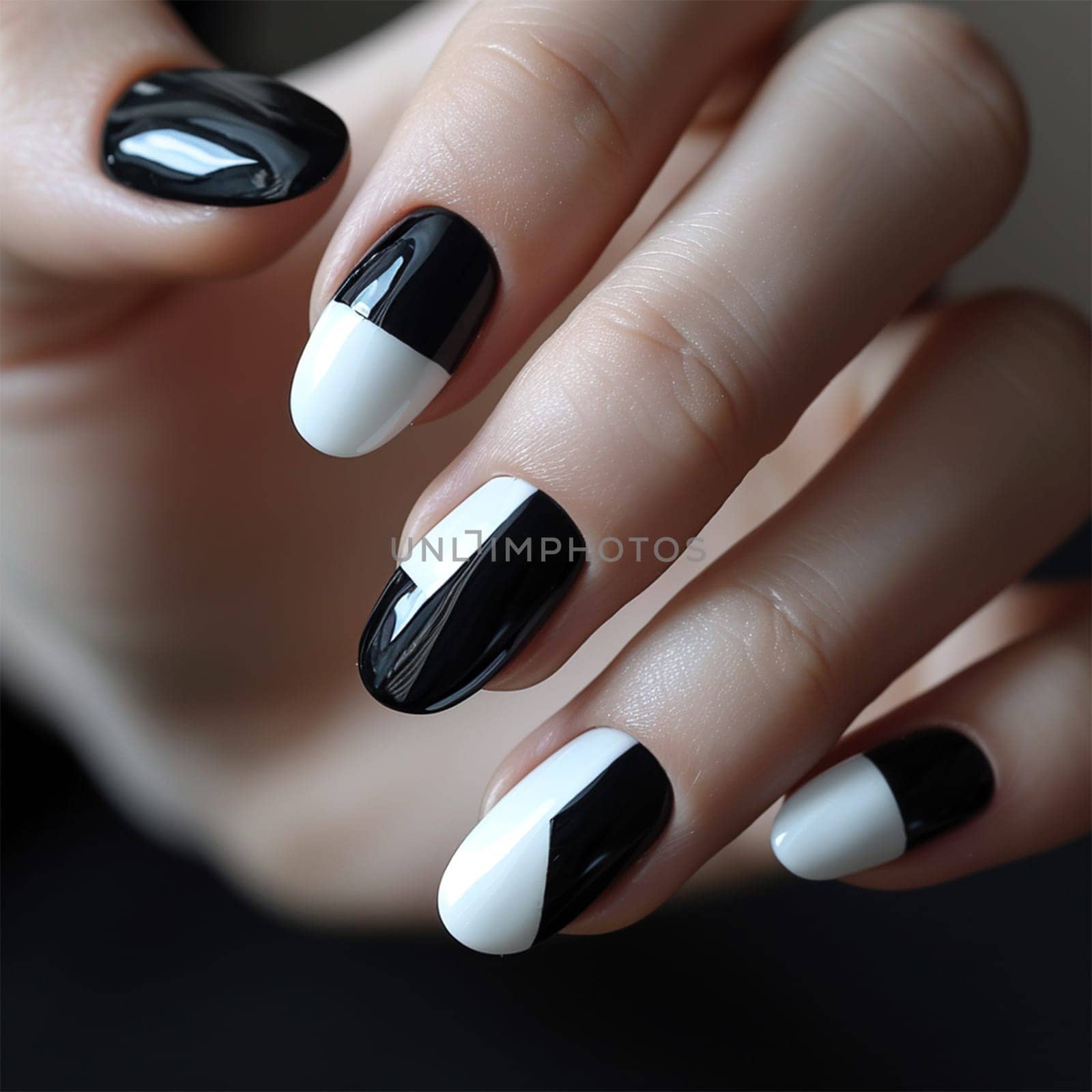 Beautiful manicure for long nails in black and white ,geometric nail design and extensions in a nail salon