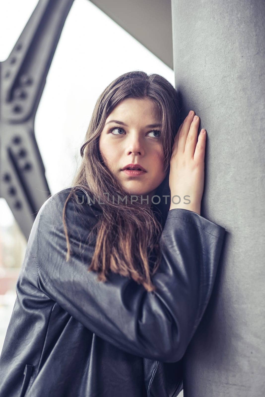 pensive young woman in the city