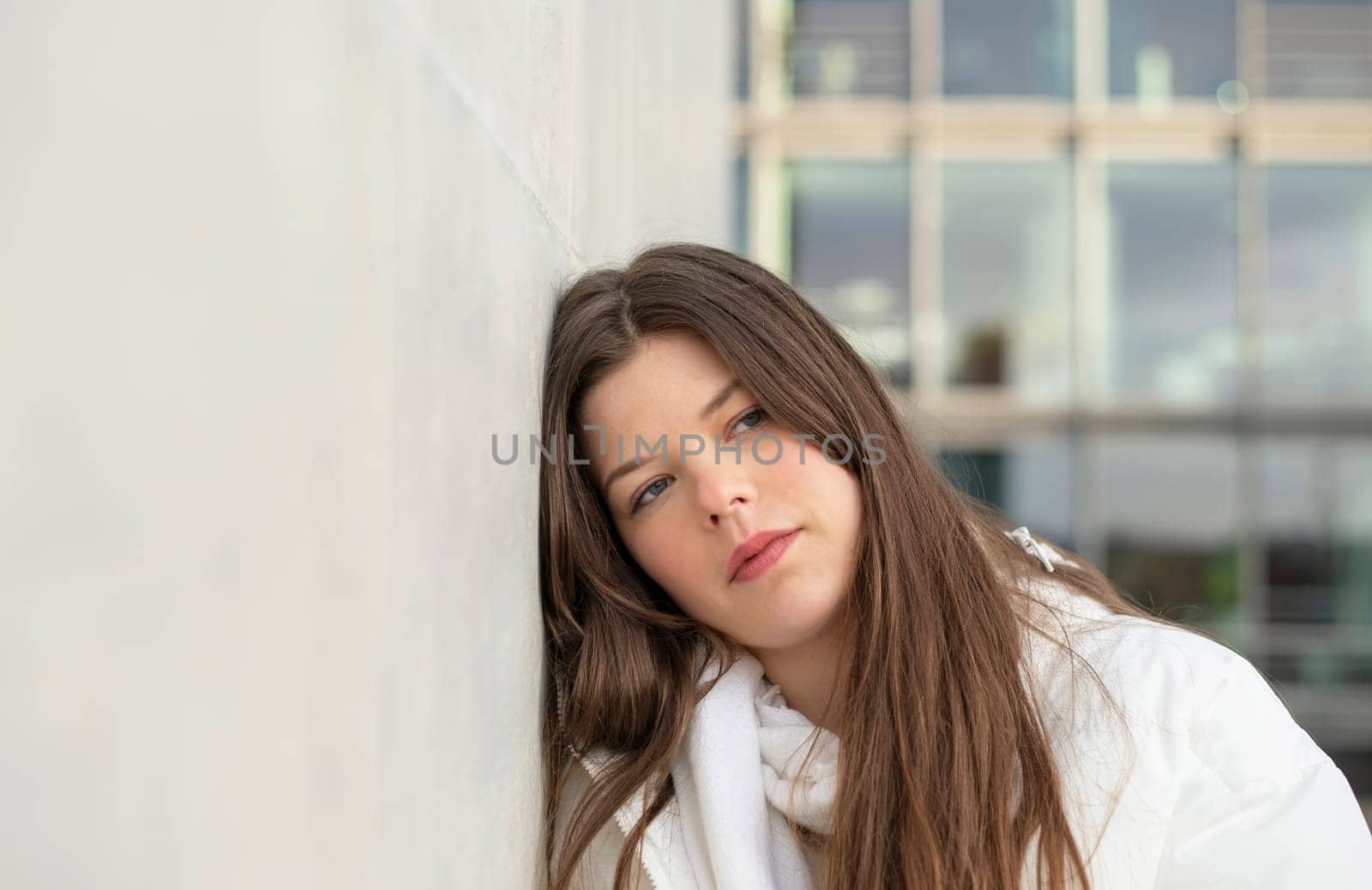 pensive young woman in the city