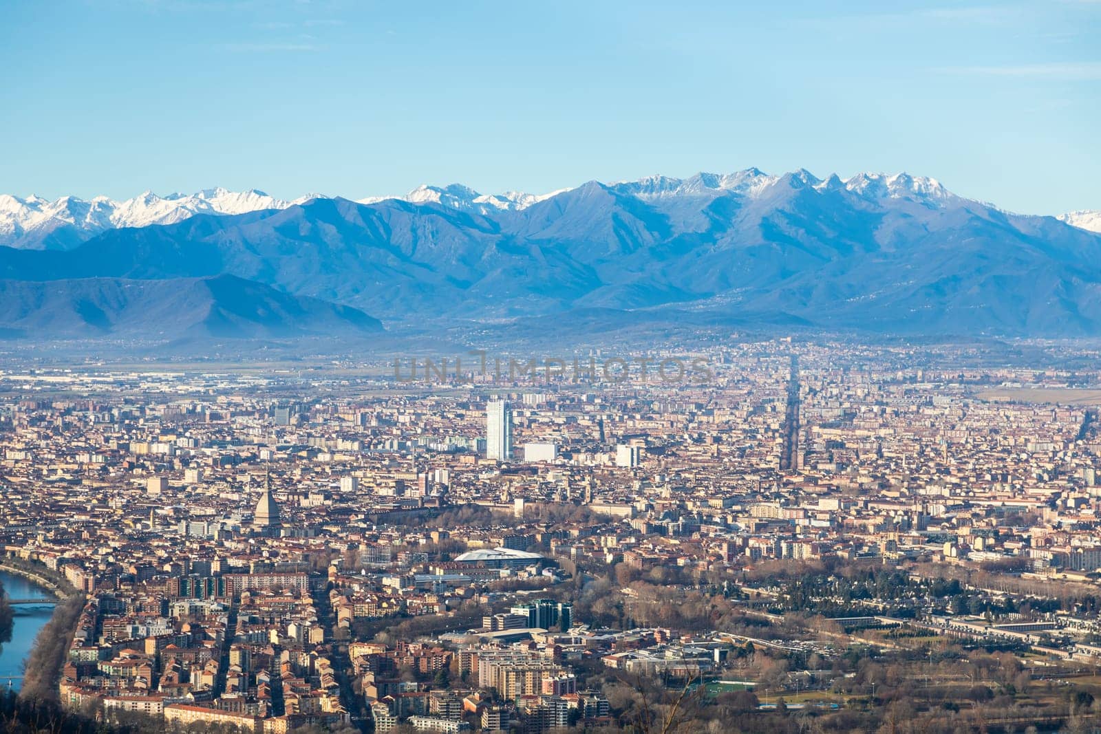 Turin, Italy - 24 December 2023: panoramic view with Alps and blue sky