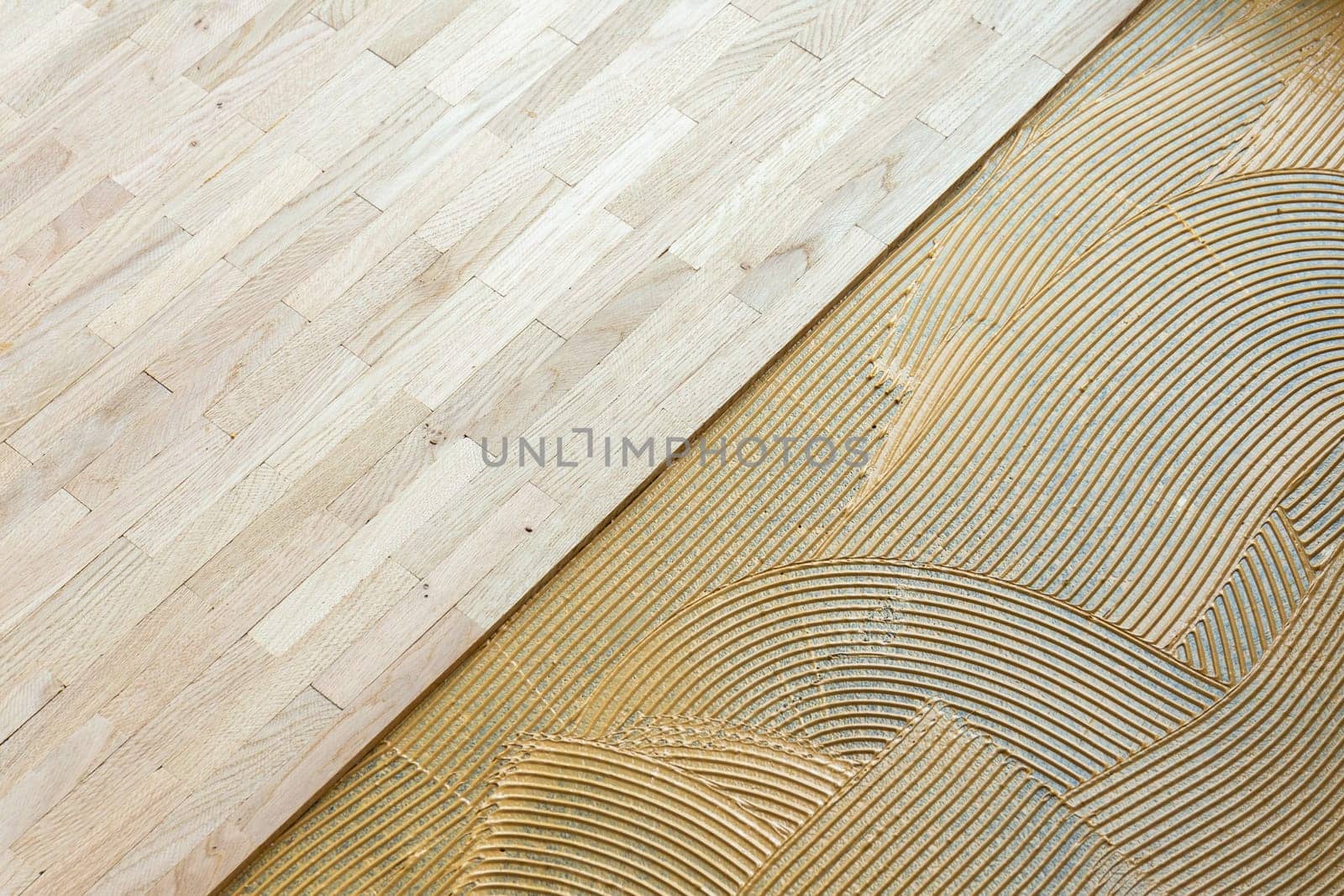 pattern of glue for fixing the parquet at the construction site