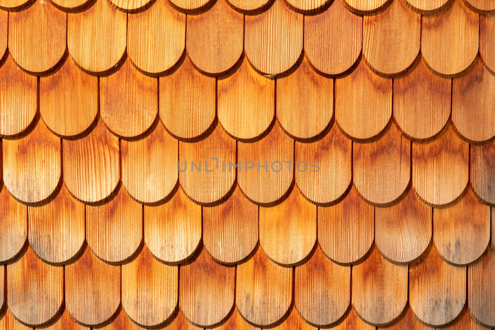 pattern of wooden roof shingles in harmonic structure