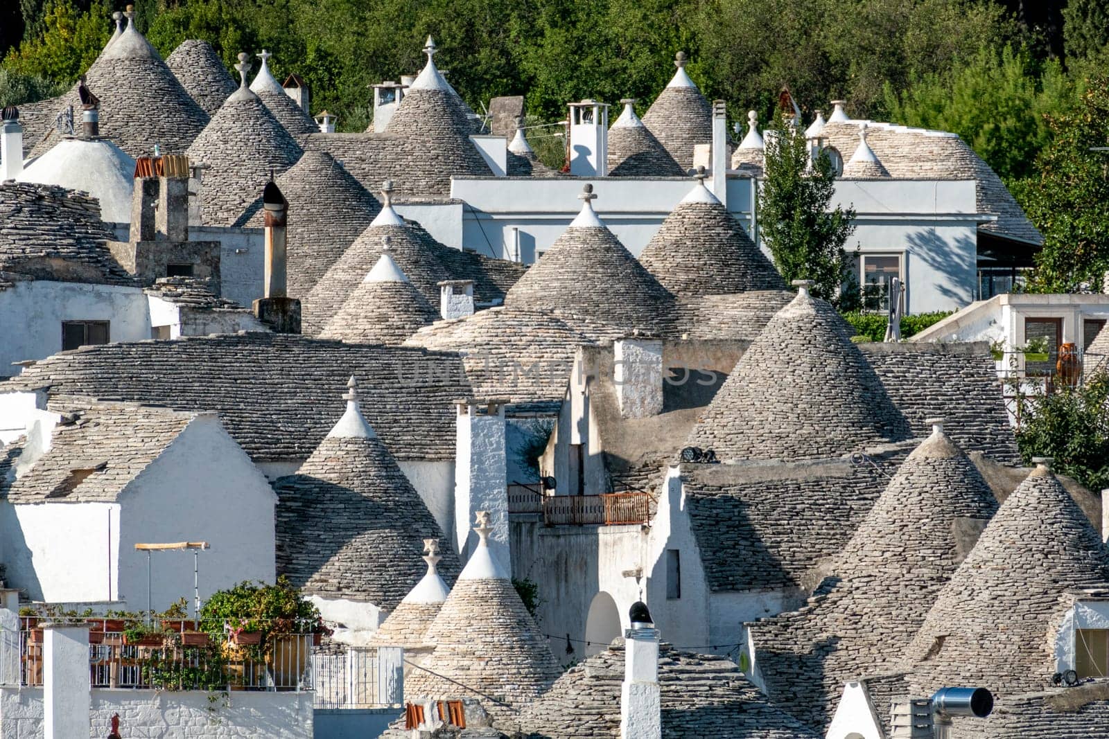 scenic historic stone trullis in Alberobello, Italy