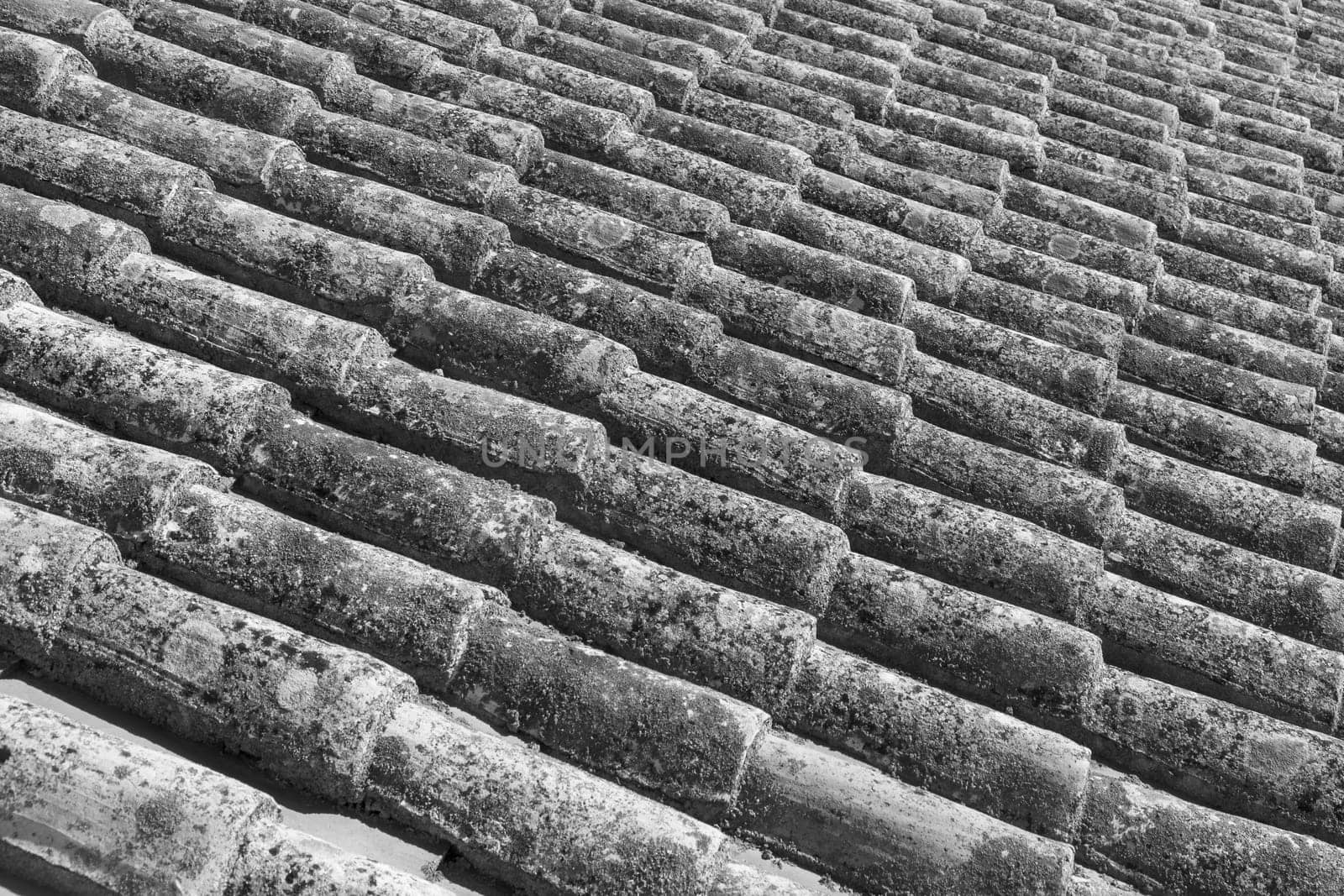 pattern of old red roof tiles gives a harmonic background