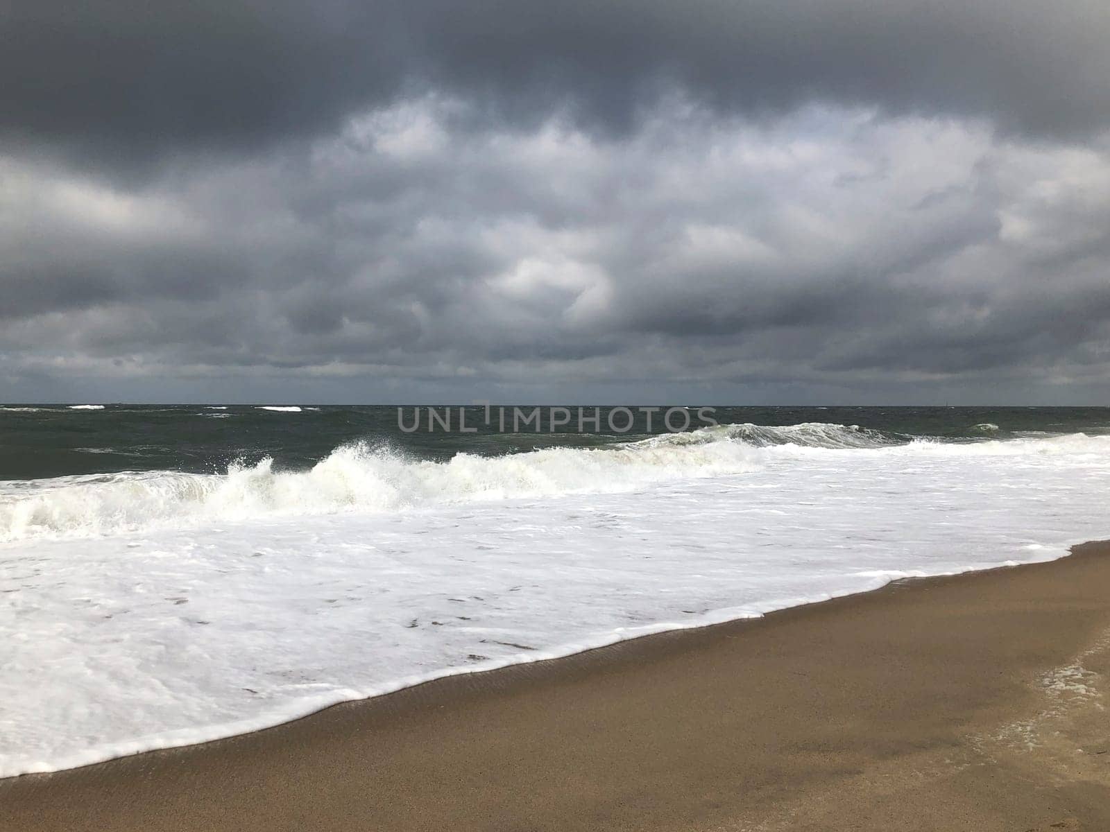 scenic autumn sandy beach with waves and dunes in Sylt, Germany