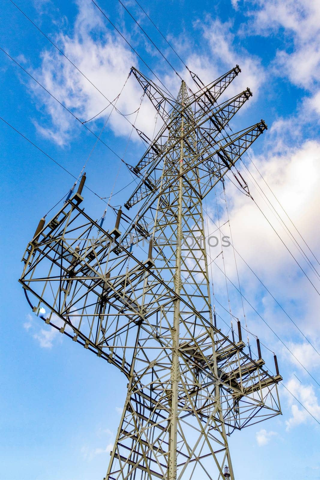 view of electric pylon under clear blue sky