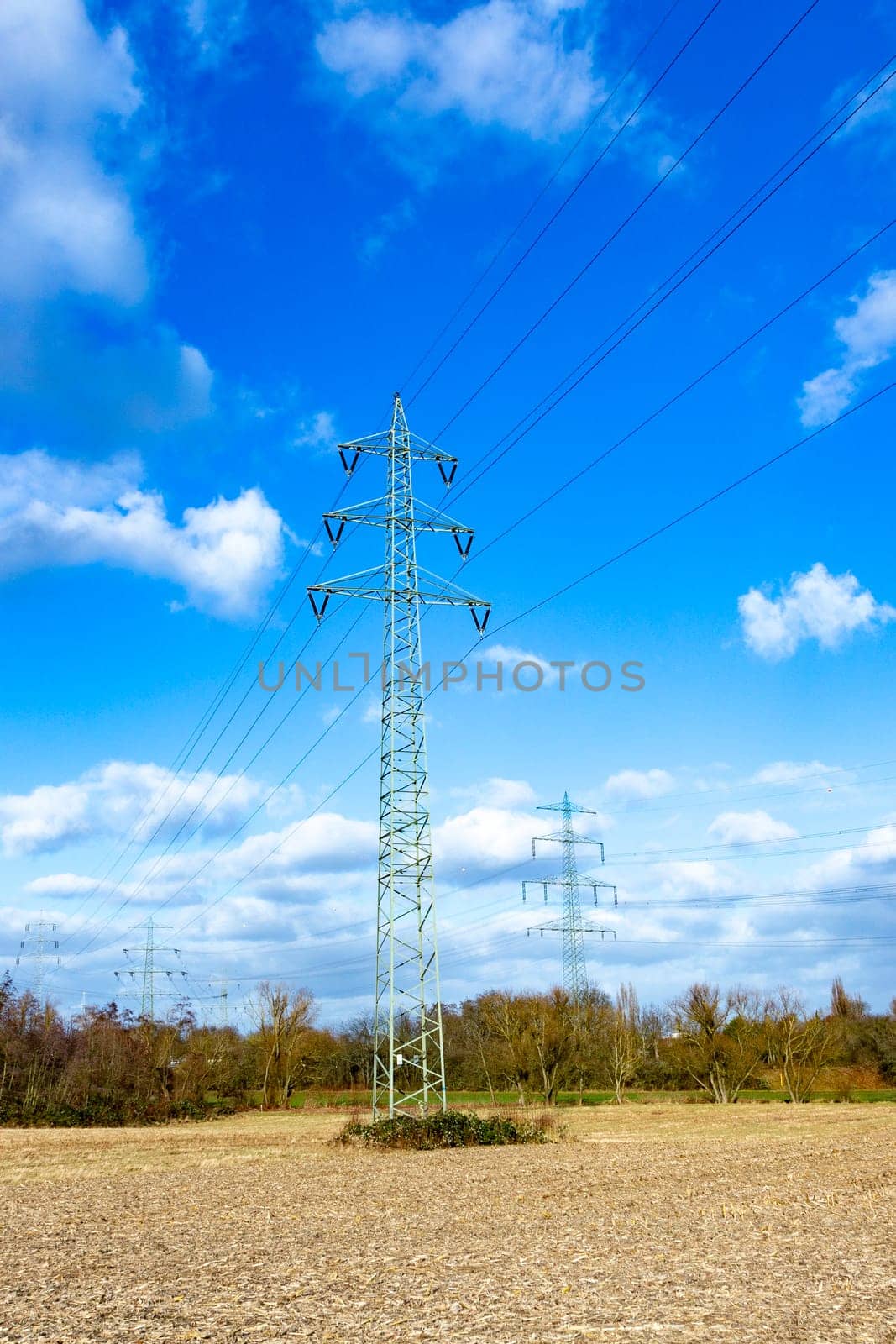 view of electric pylon under clear blue sky