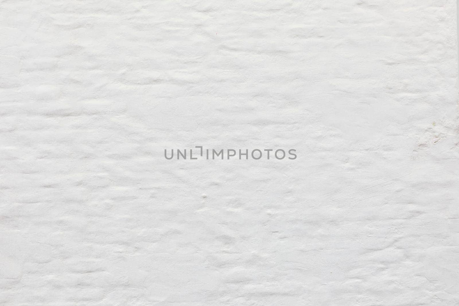 old white brick wall with soft plaster coating in Sylt