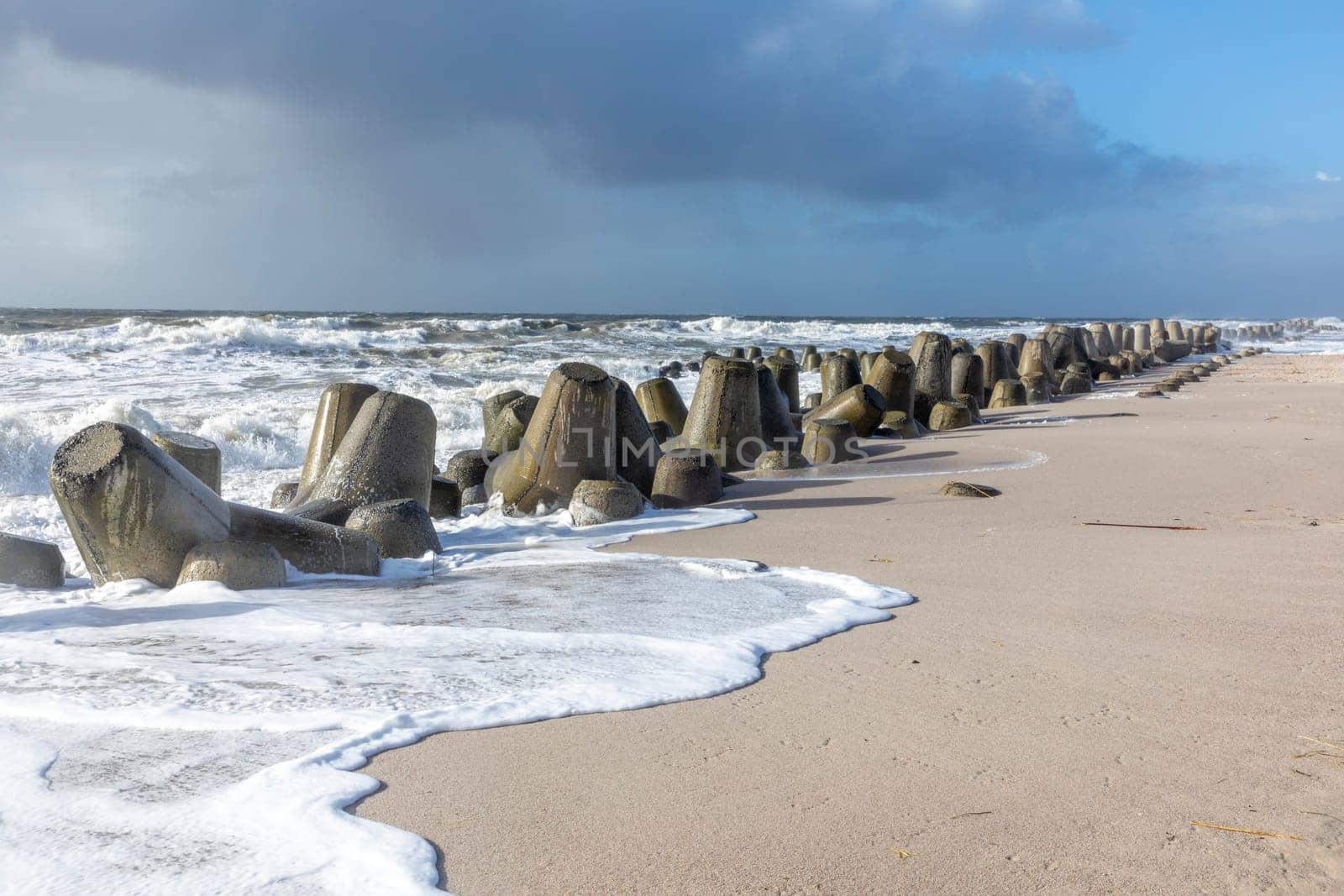 wind breaker at the coast in Sylt in bad weather storm, Hoernum