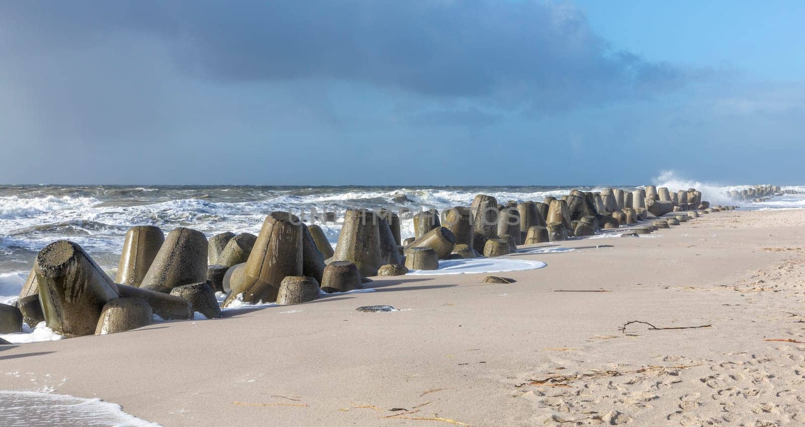 wind breaker at the coast in Sylt in bad weather storm, Hoernum