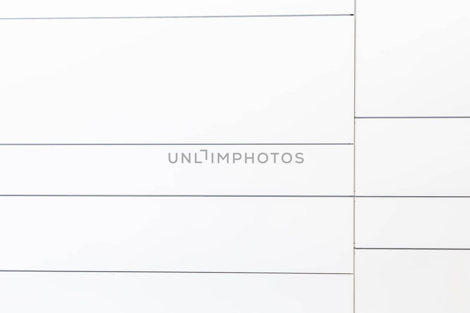 pattern of white wall with lines in harmonic compositionv