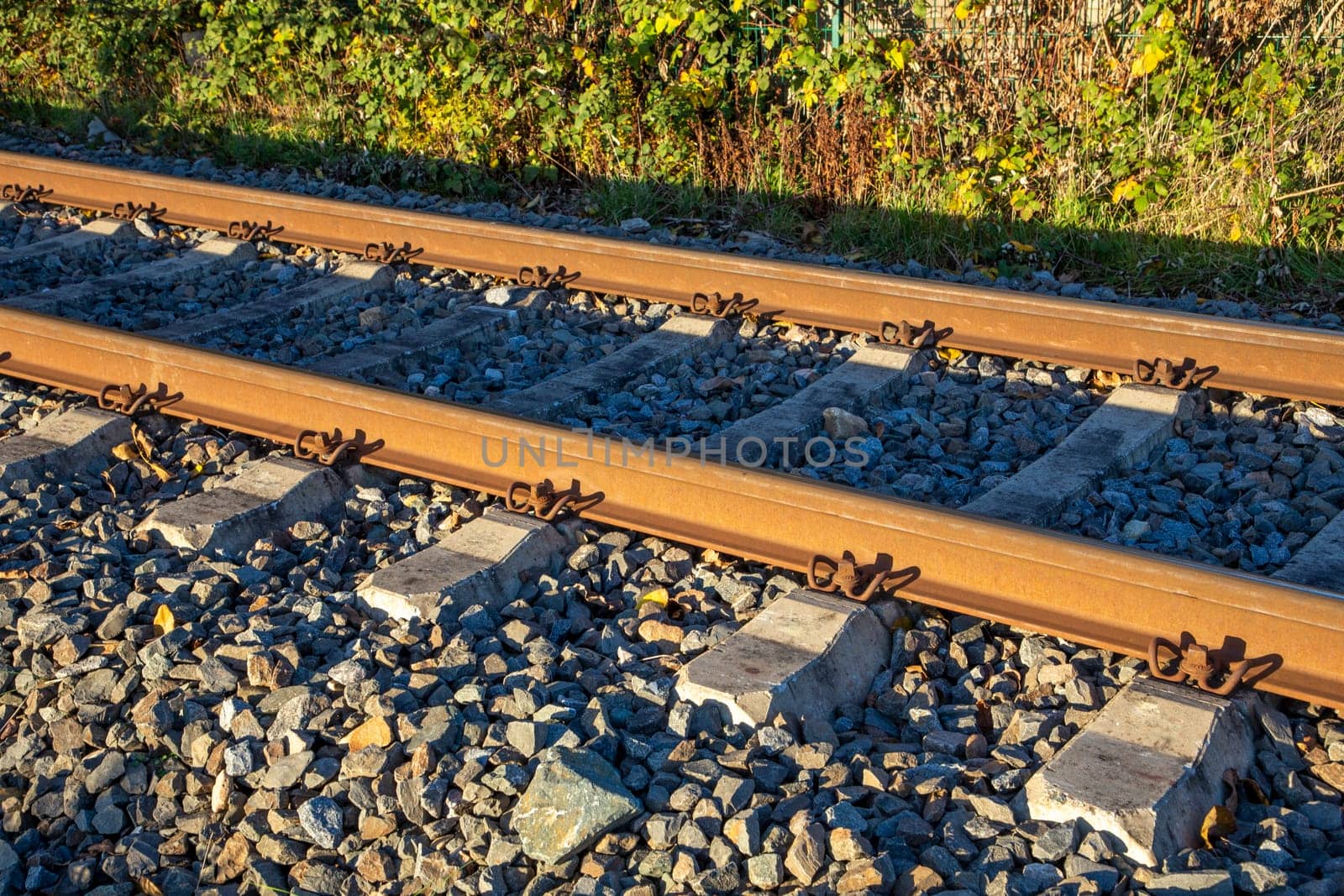 rusty rails in detail in sunset color