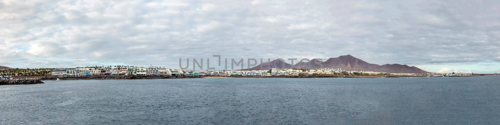 scenic view of Blaya Blanca in Lanzarote from seaside with spectacular sky