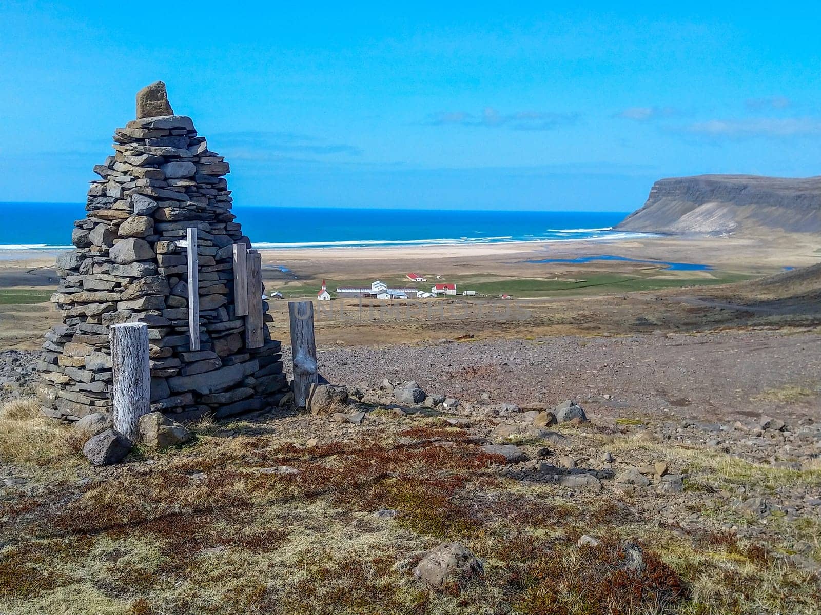 scenic view to Iceland's westfjord with stone piles as marker, Iceland